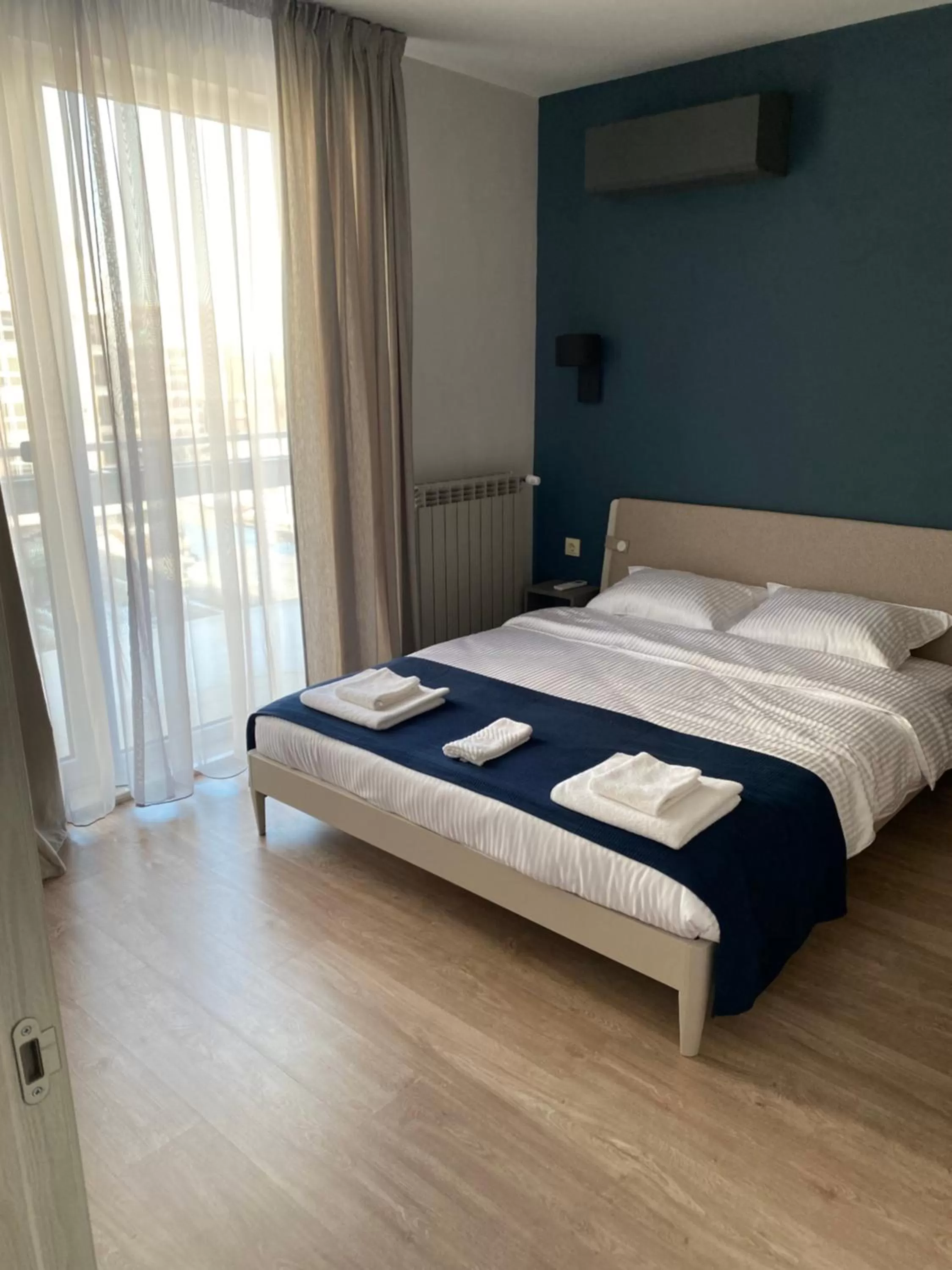 Bed in 7th Sense boutique apartments