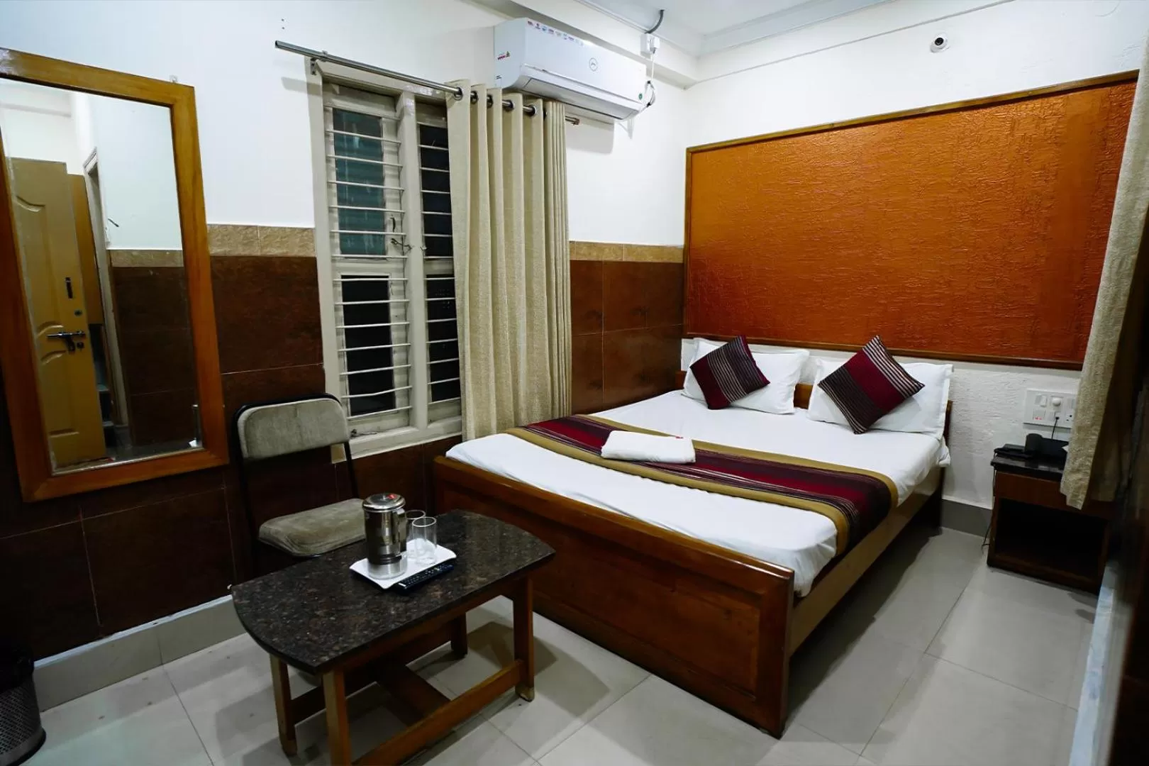 Bed in HOTEL PRAKAASH RESIDENCY