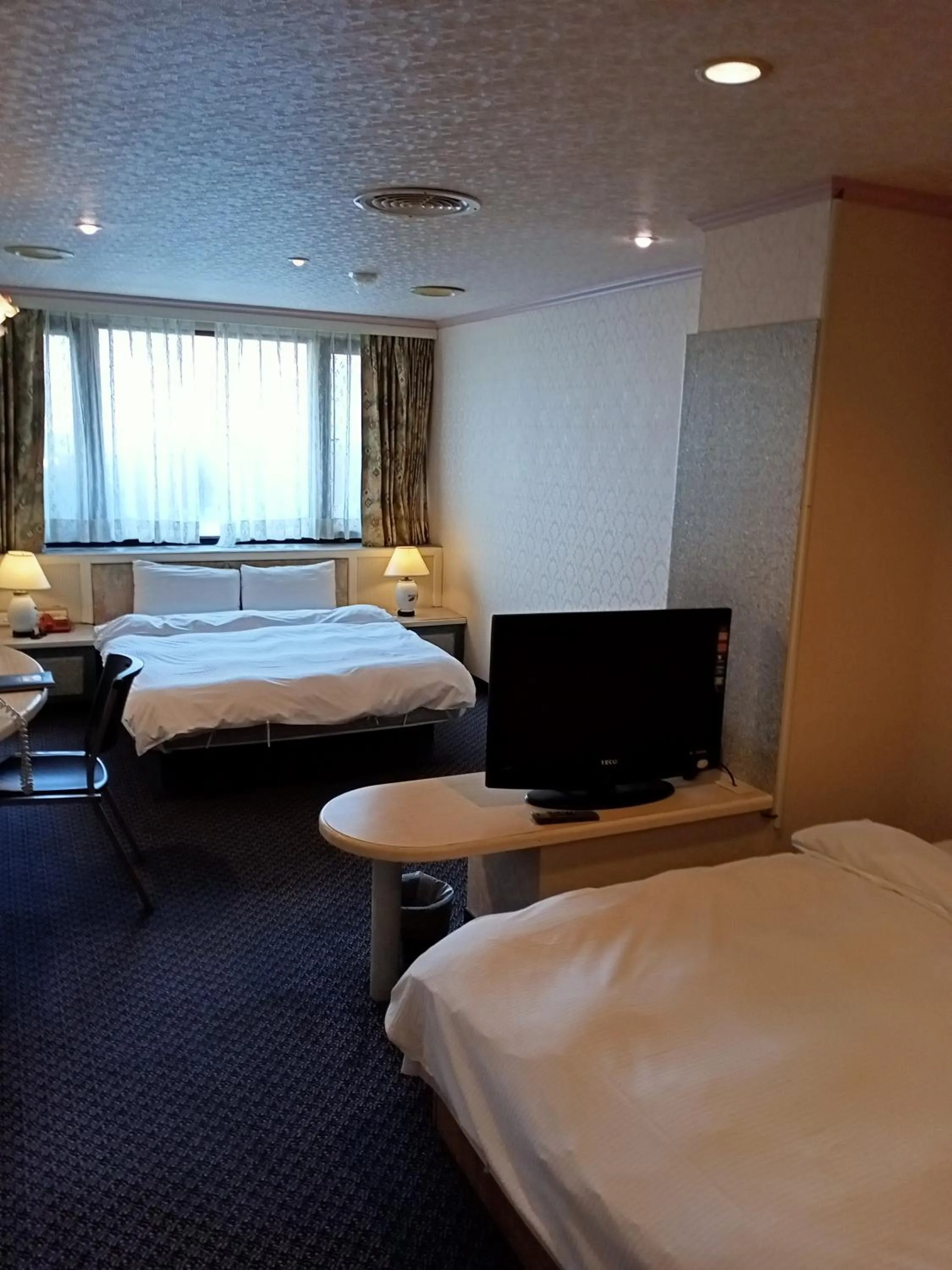 Photo of the whole room, Bed in Chungli Business Hotel