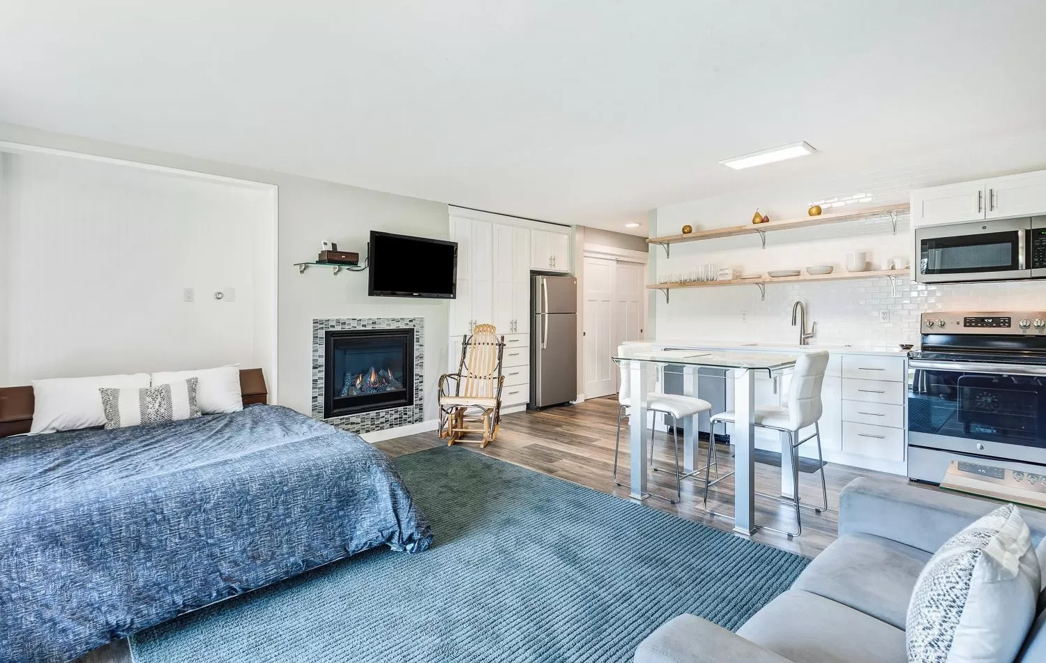 Bed, Seating Area in Bend Riverside Condos