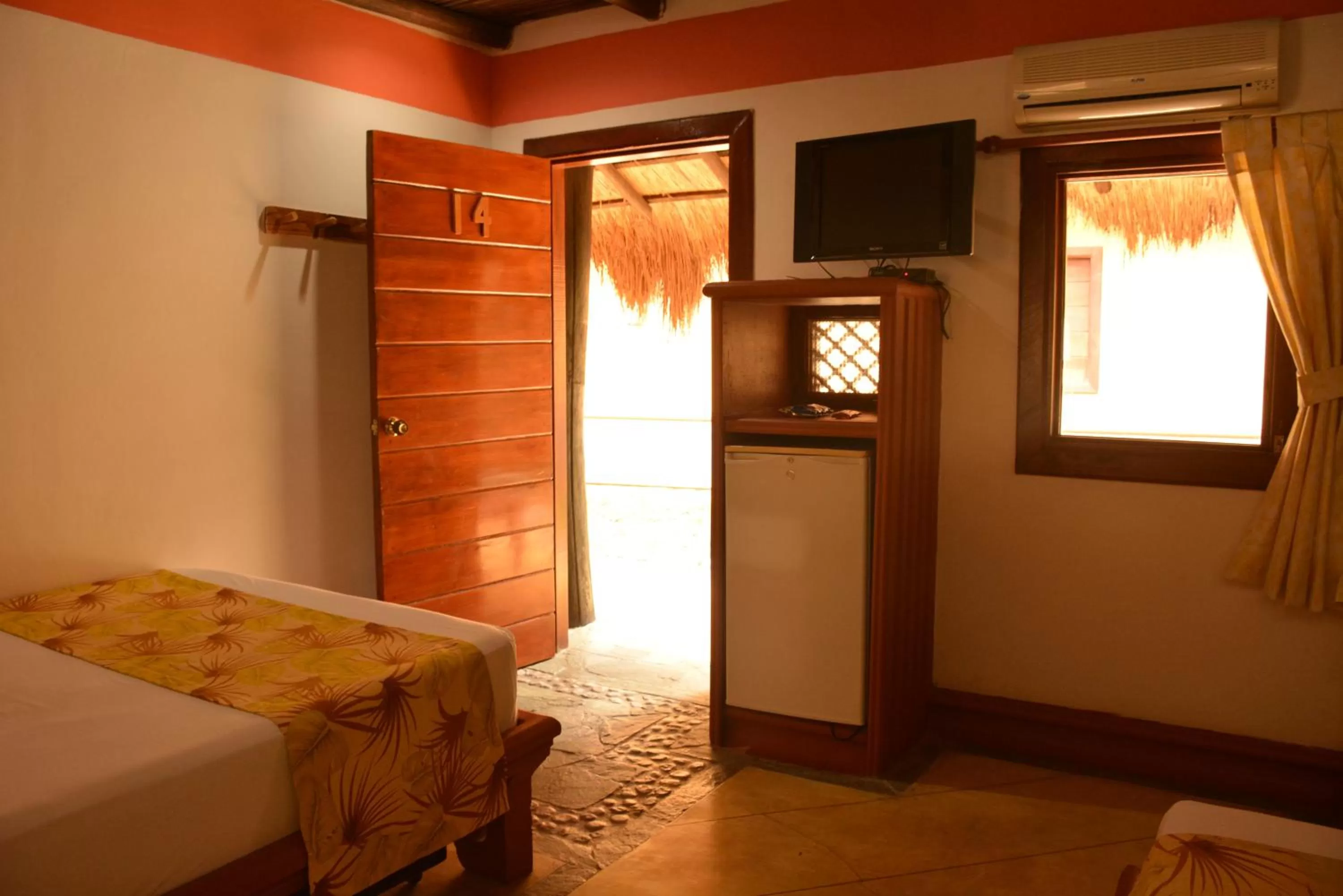 Photo of the whole room, TV/Entertainment Center in Hotel Portón del Sol