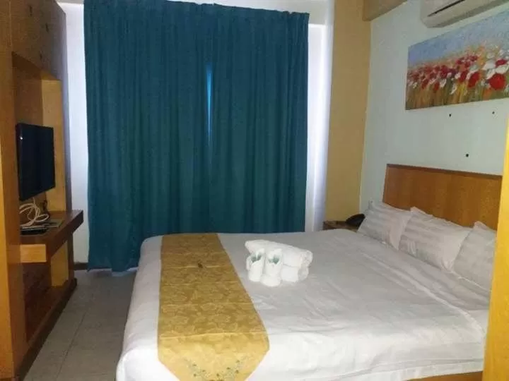 Bed in Fratini's Hotel Labuan