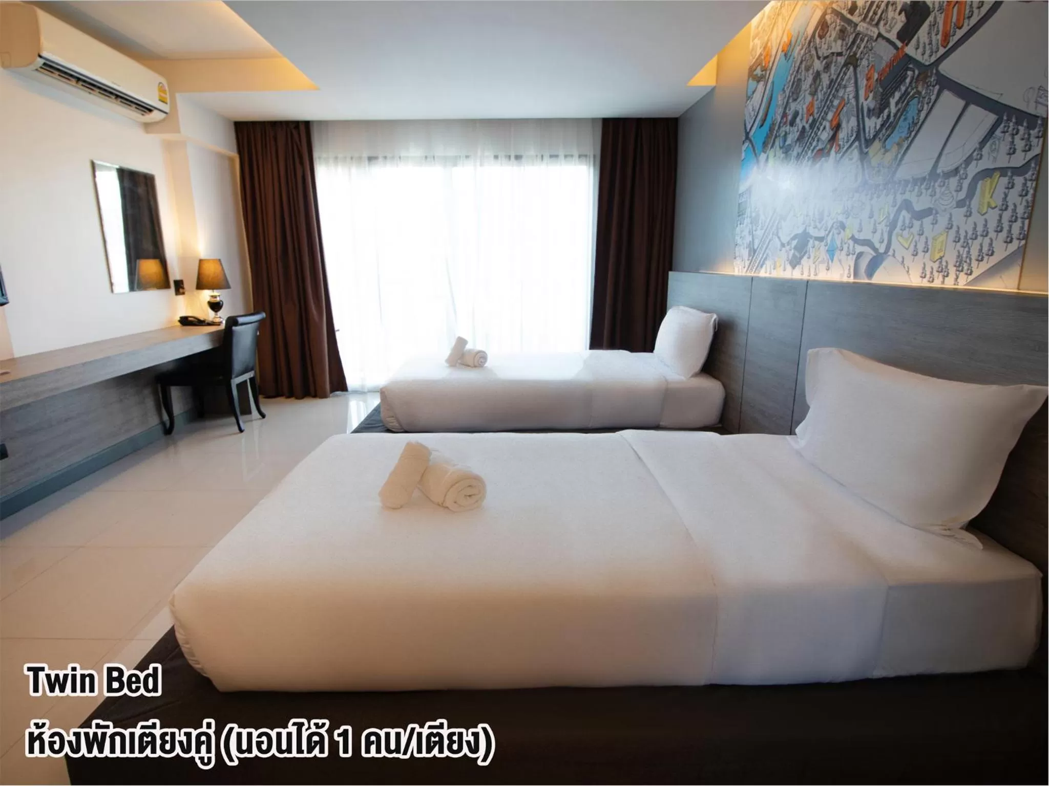 Bed in Fortune D Hotel Phitsanulok