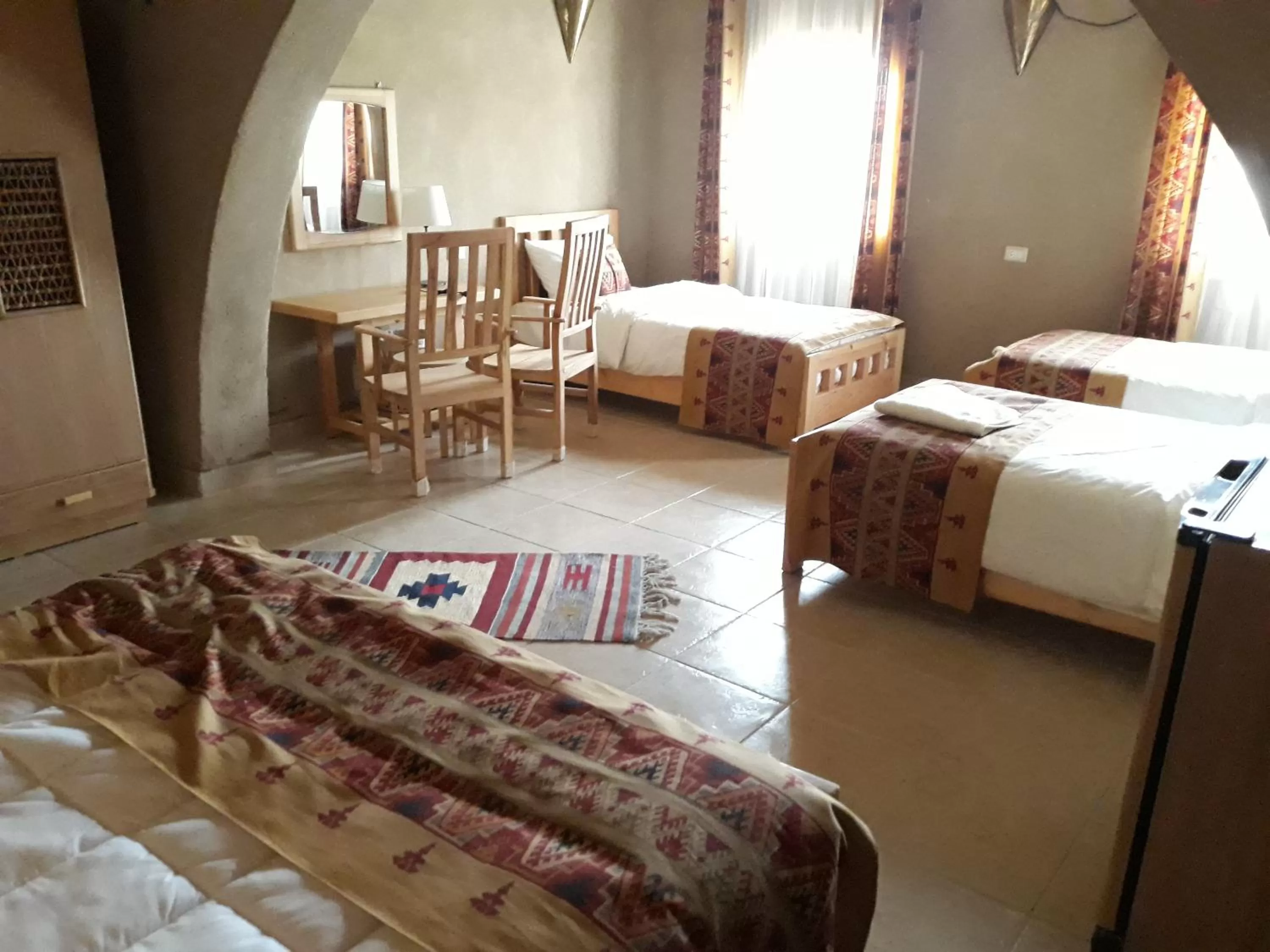 Bed in Embrace Hotel