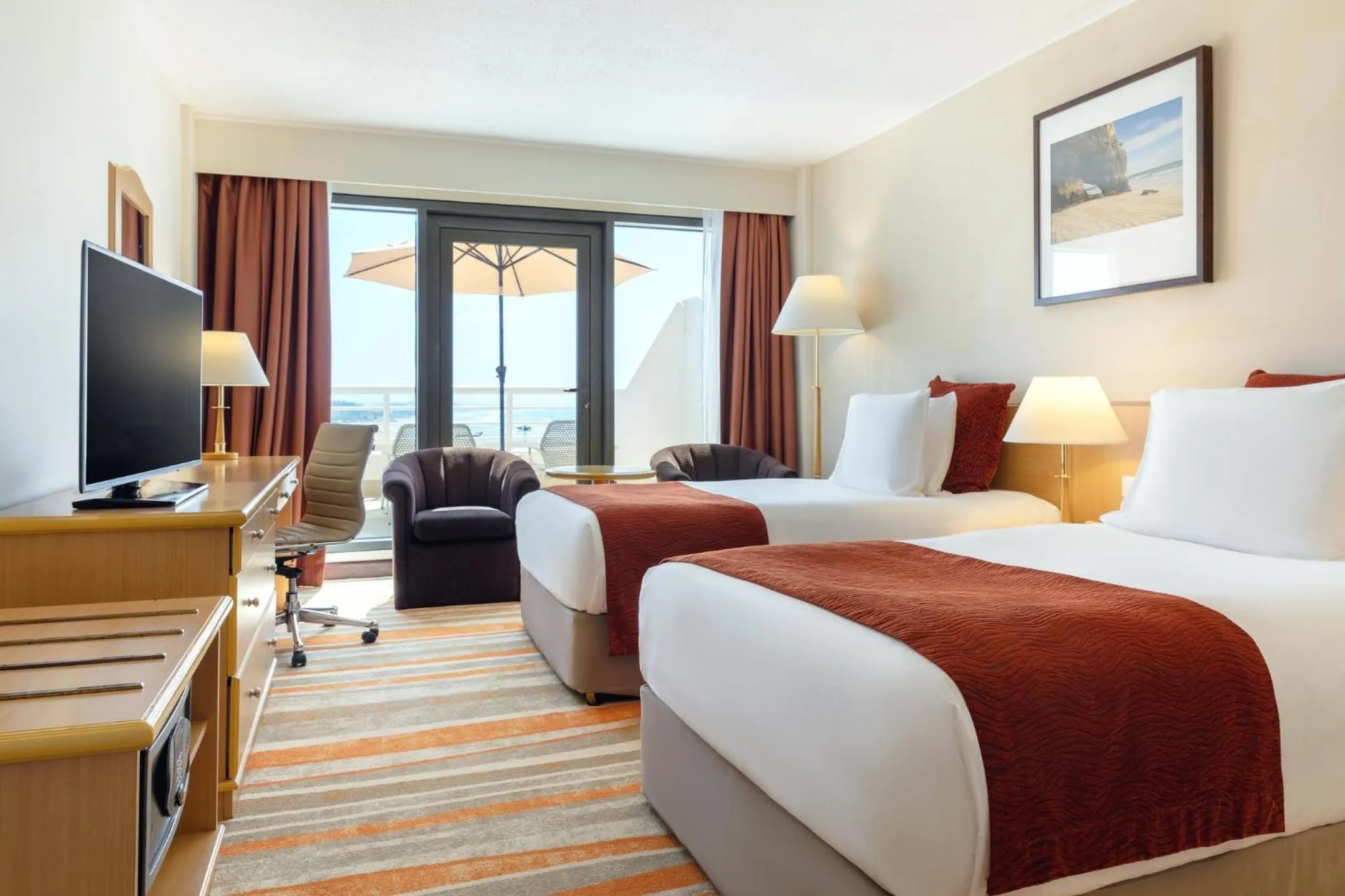 Photo of the whole room, Bed in Crowne Plaza Muscat by IHG