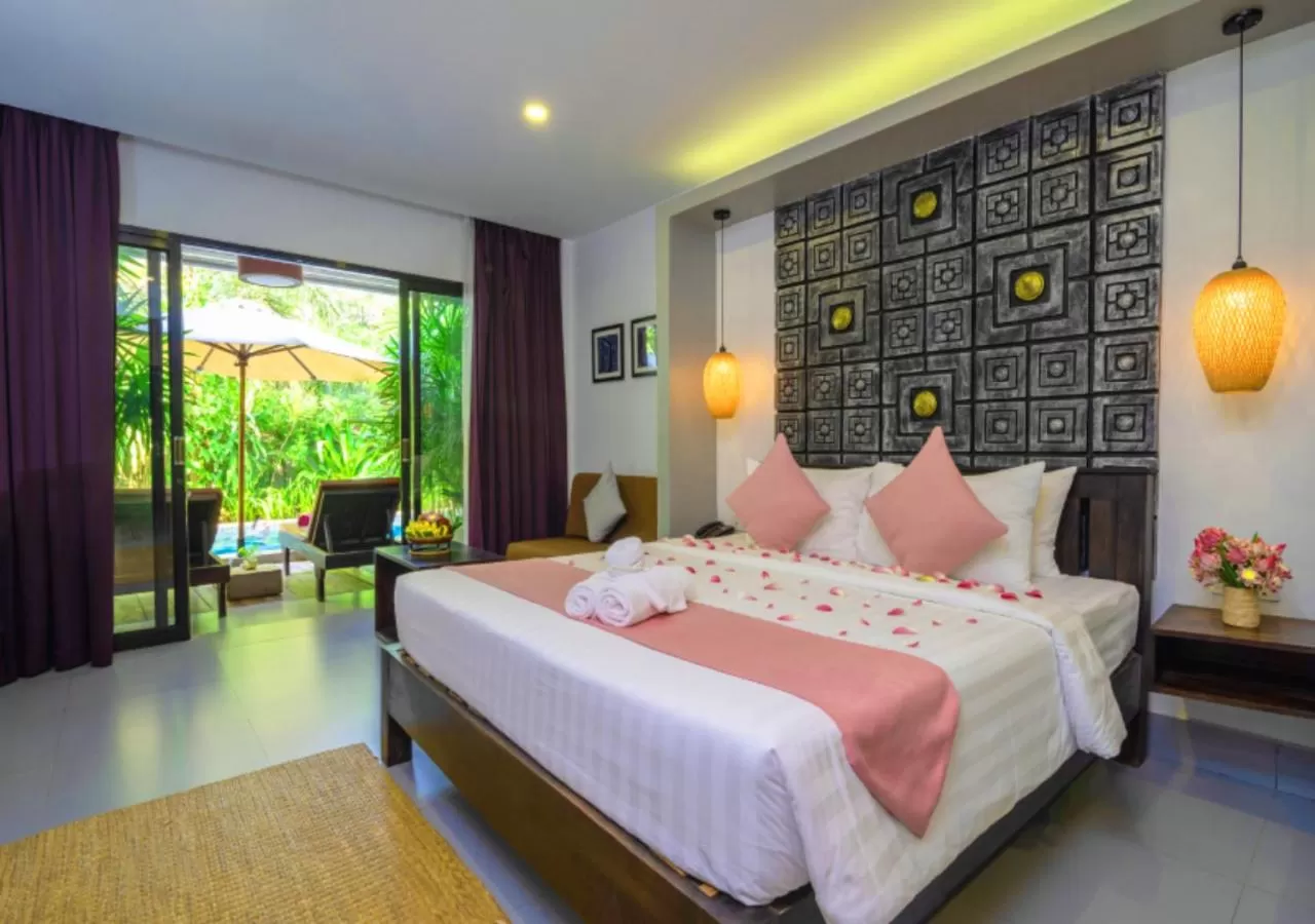 Bed in Ladear Privilege Rooms