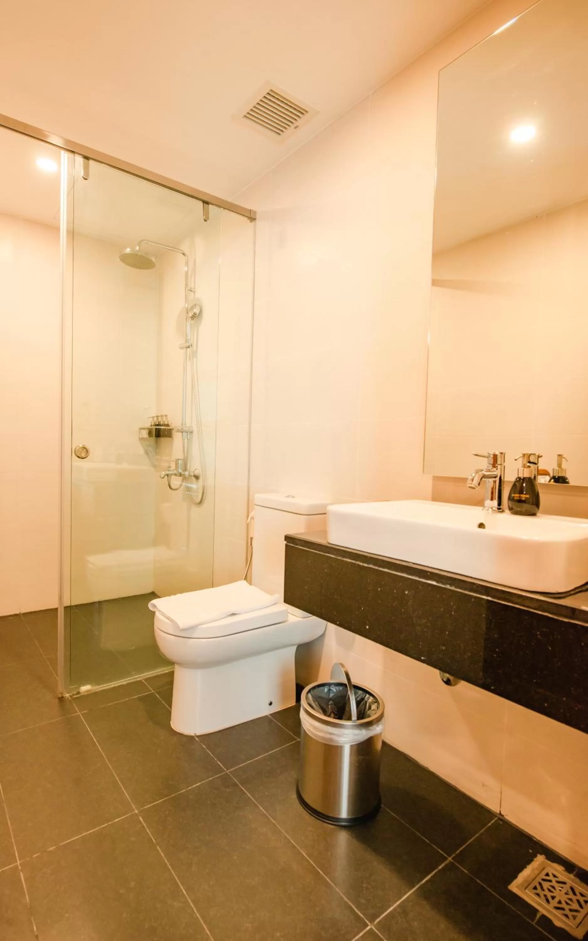Toilet in Maple Hotel & Apartment