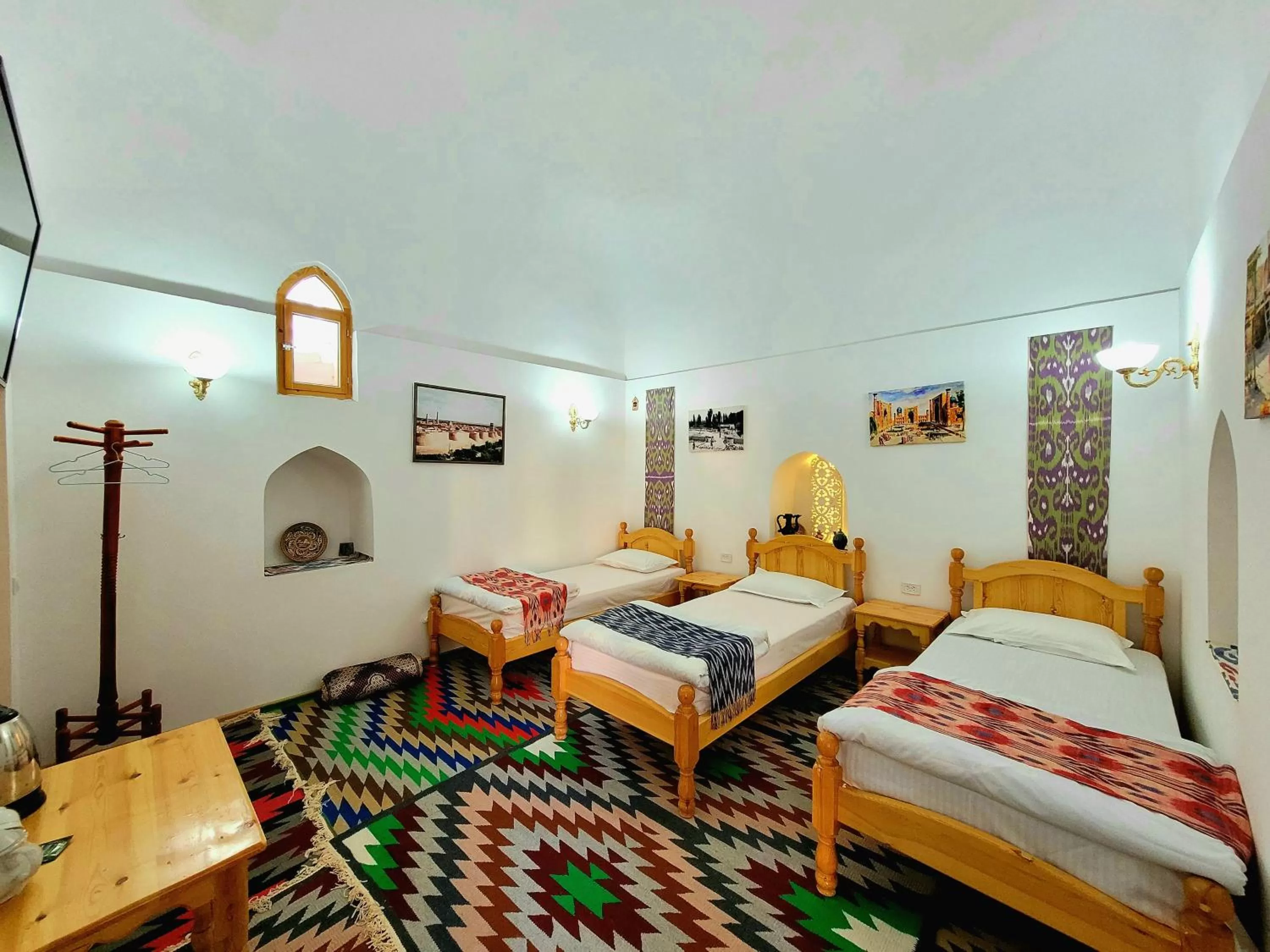 Photo of the whole room, Bed in madrasah Polvon-Qori boutique hotel