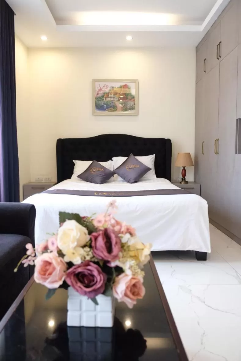 Bed in Aisha HOTELS and APARTMENTS