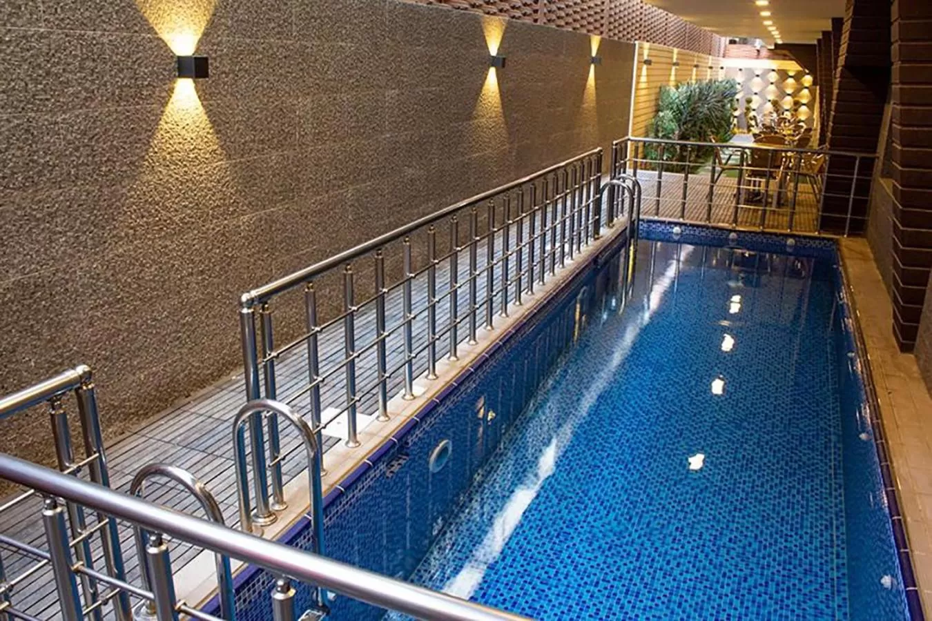 Swimming pool in Aquila Al Hamra Hotel