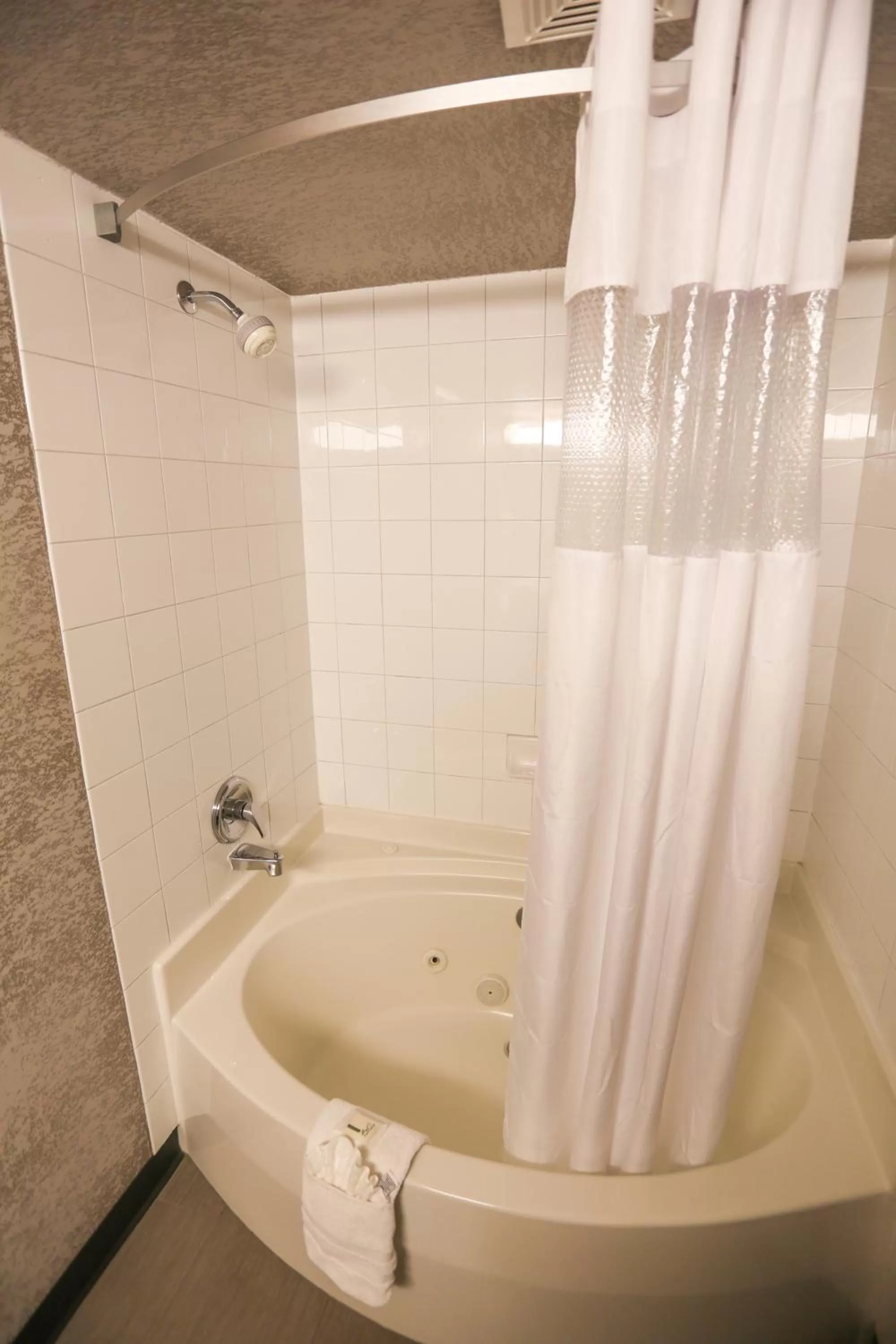 Bathroom in Days Inn by Wyndham Calgary Airport