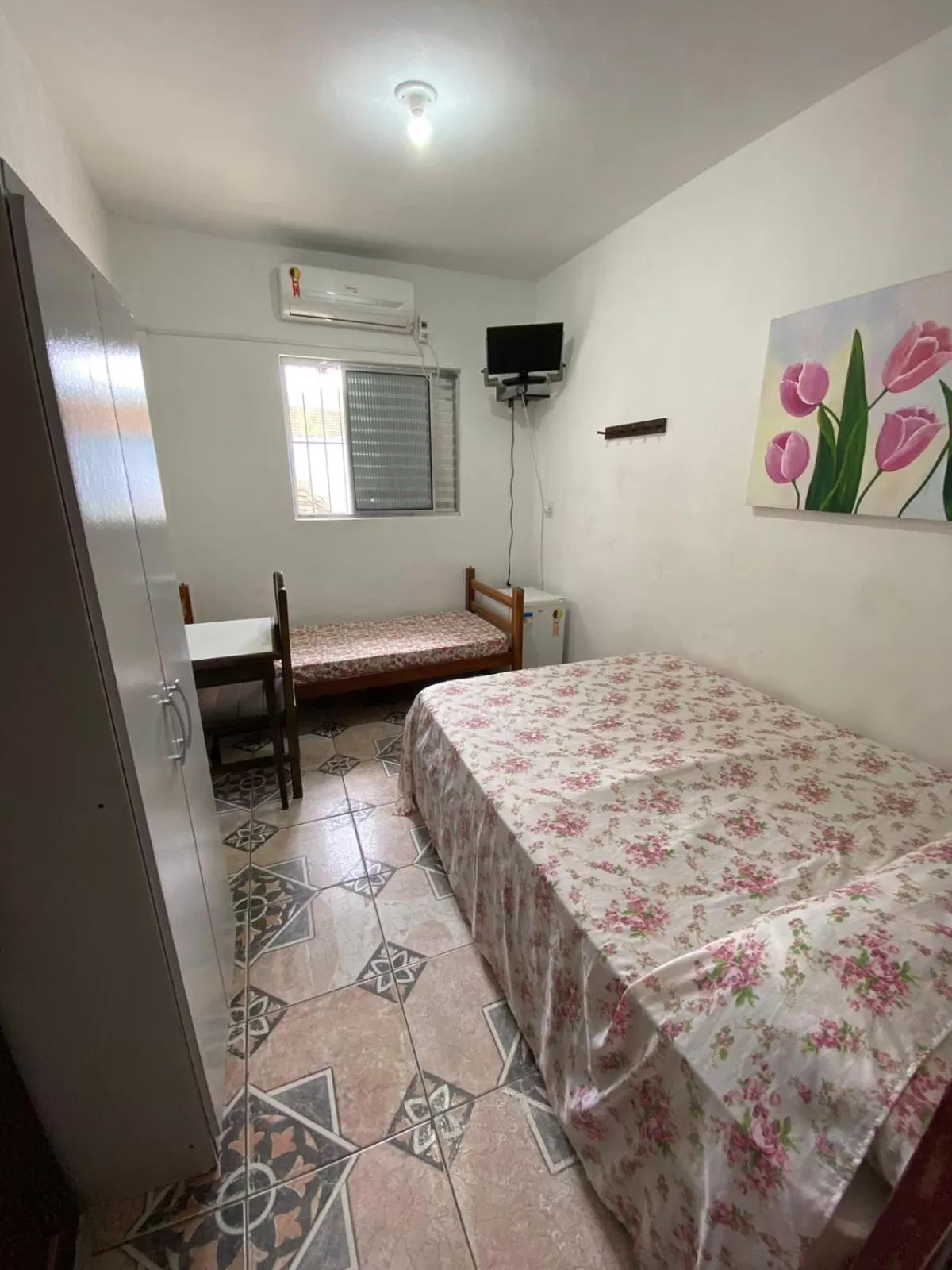 Bed in Pousada Canoas