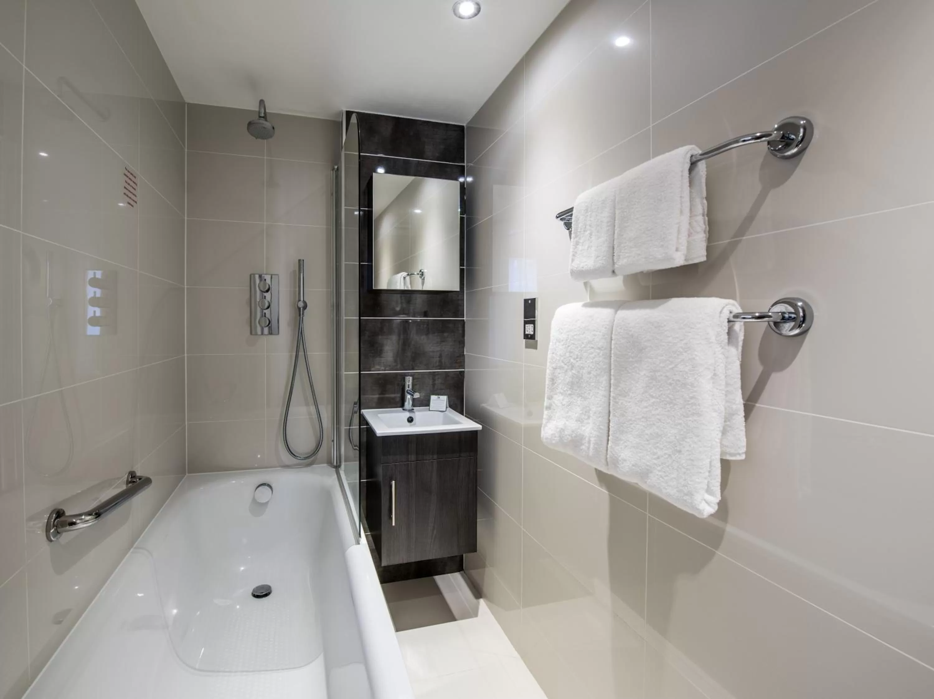 Bathroom in Holiday Inn London Kensington High St. by IHG