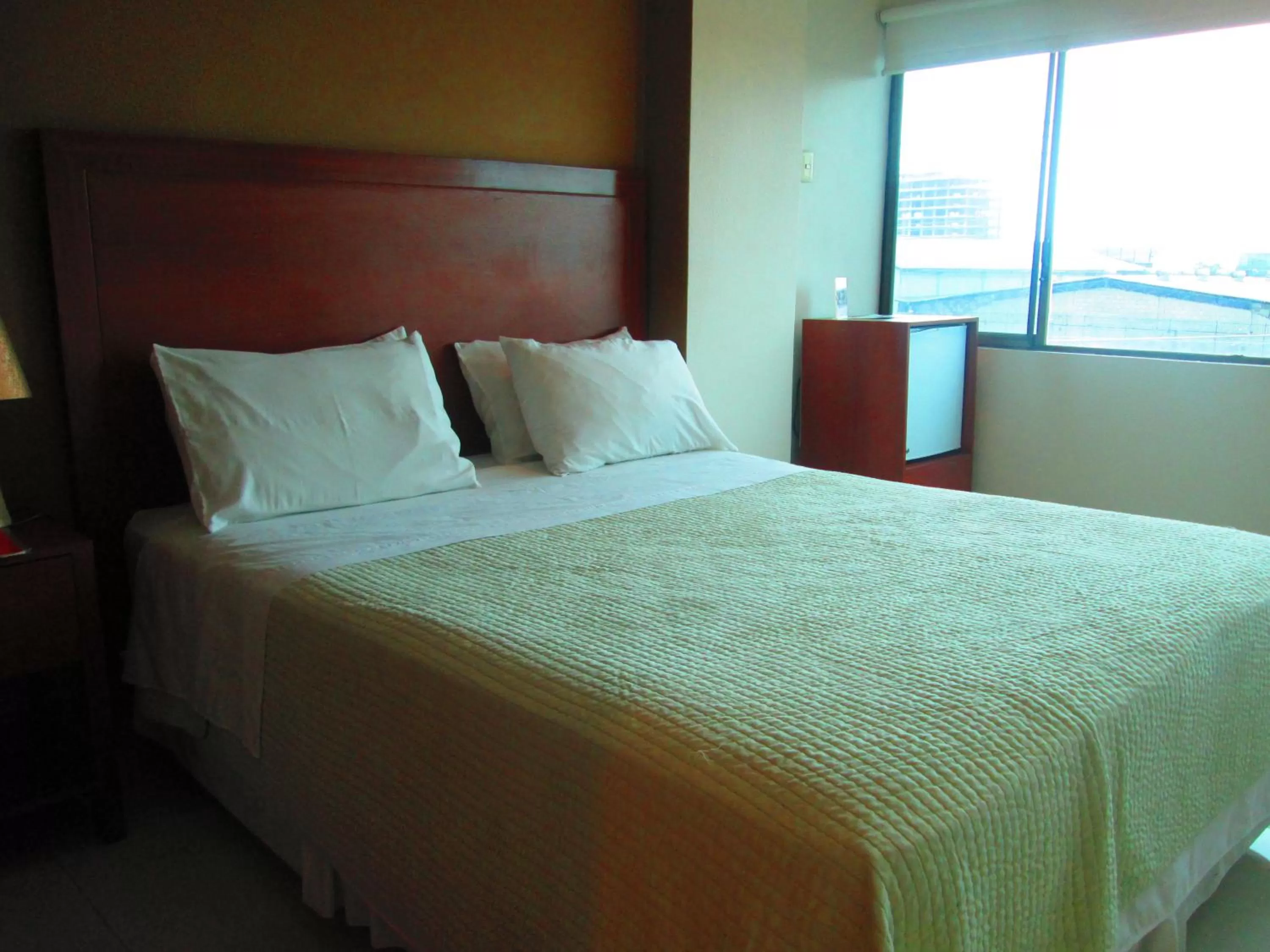 Bed in Hotel Garzota Inn