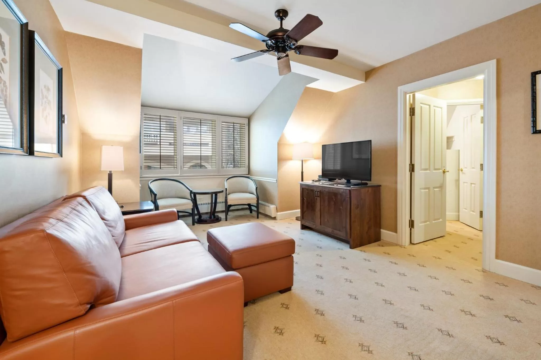 Seating area in Poste Montane Lodge by East West