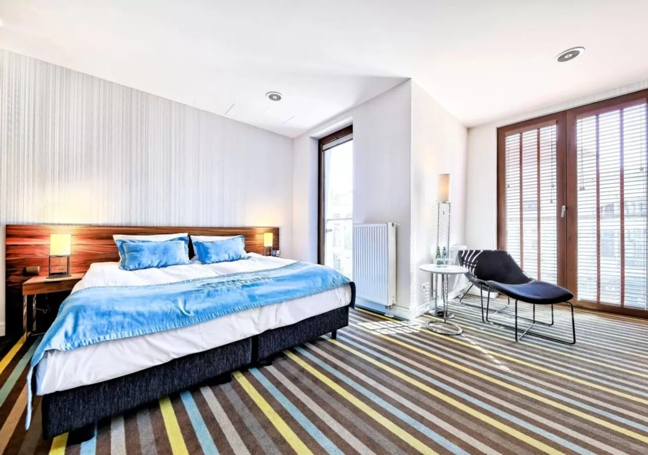 Bed in Bayjonn Boutique Hotel