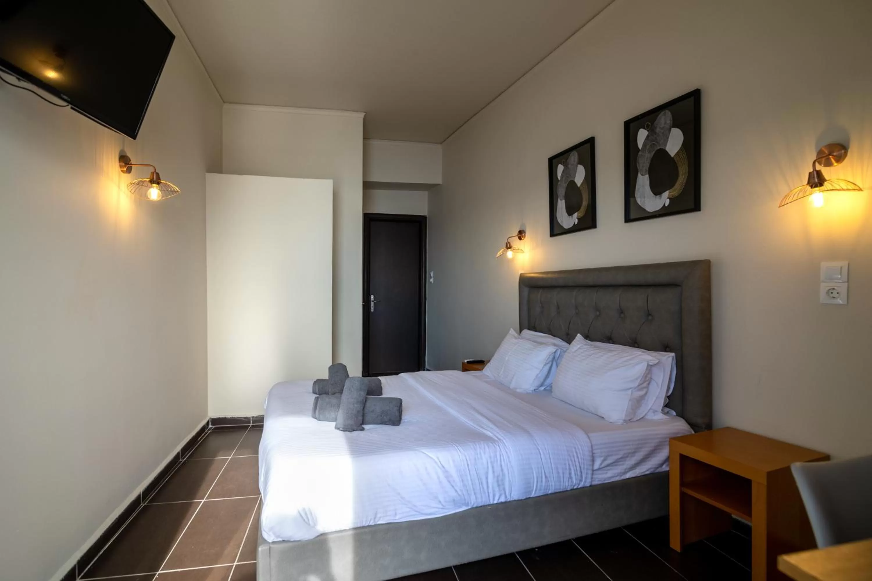 Bed in Votsalakia Hotel & Luxury Apartments