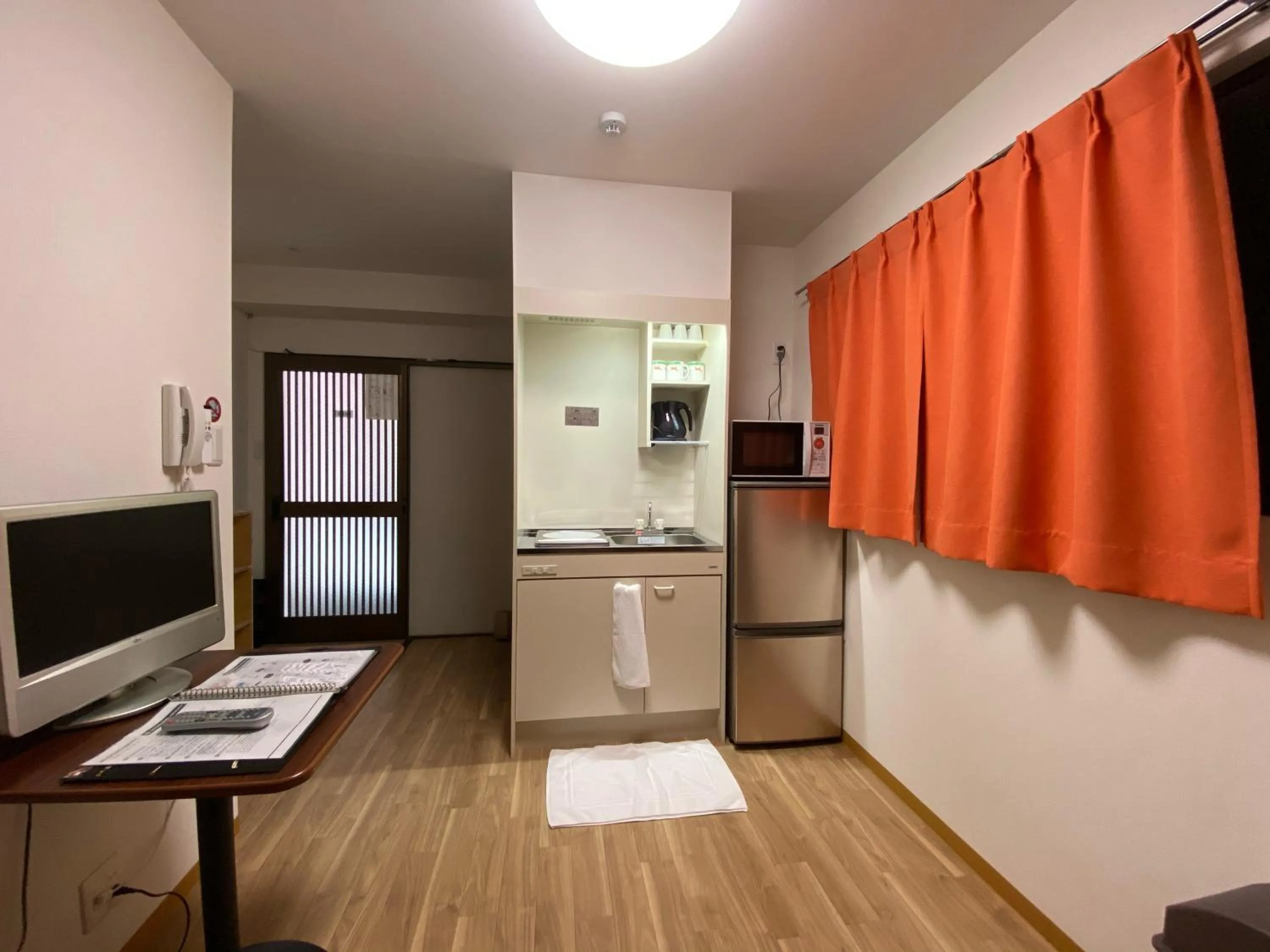 Kitchen or kitchenette in Sakura Hotel Hatagaya
