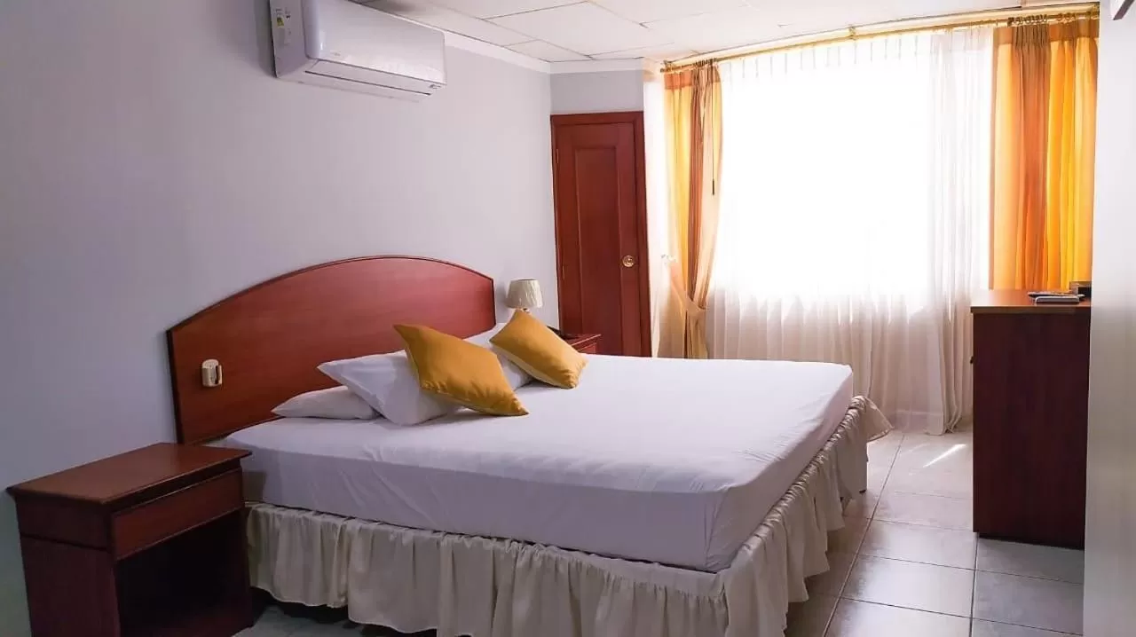 Bed in Grand Hotel Machala