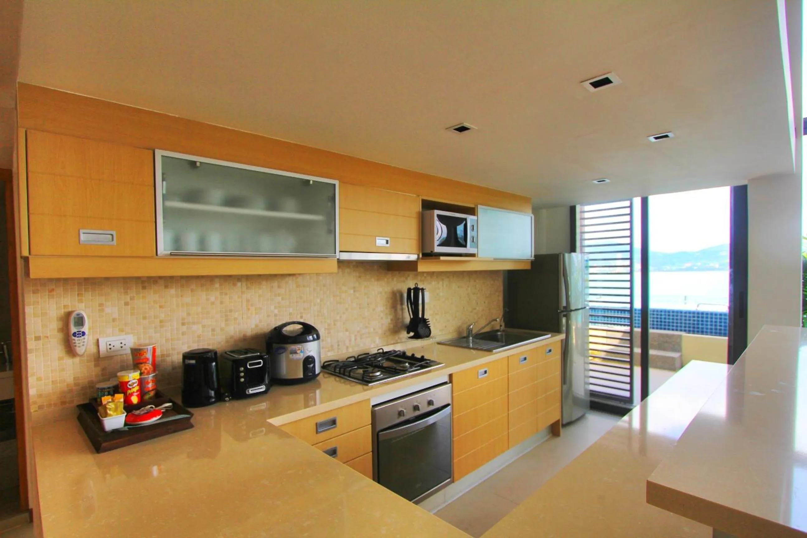 Kitchen or kitchenette in IndoChine Resort and Villas