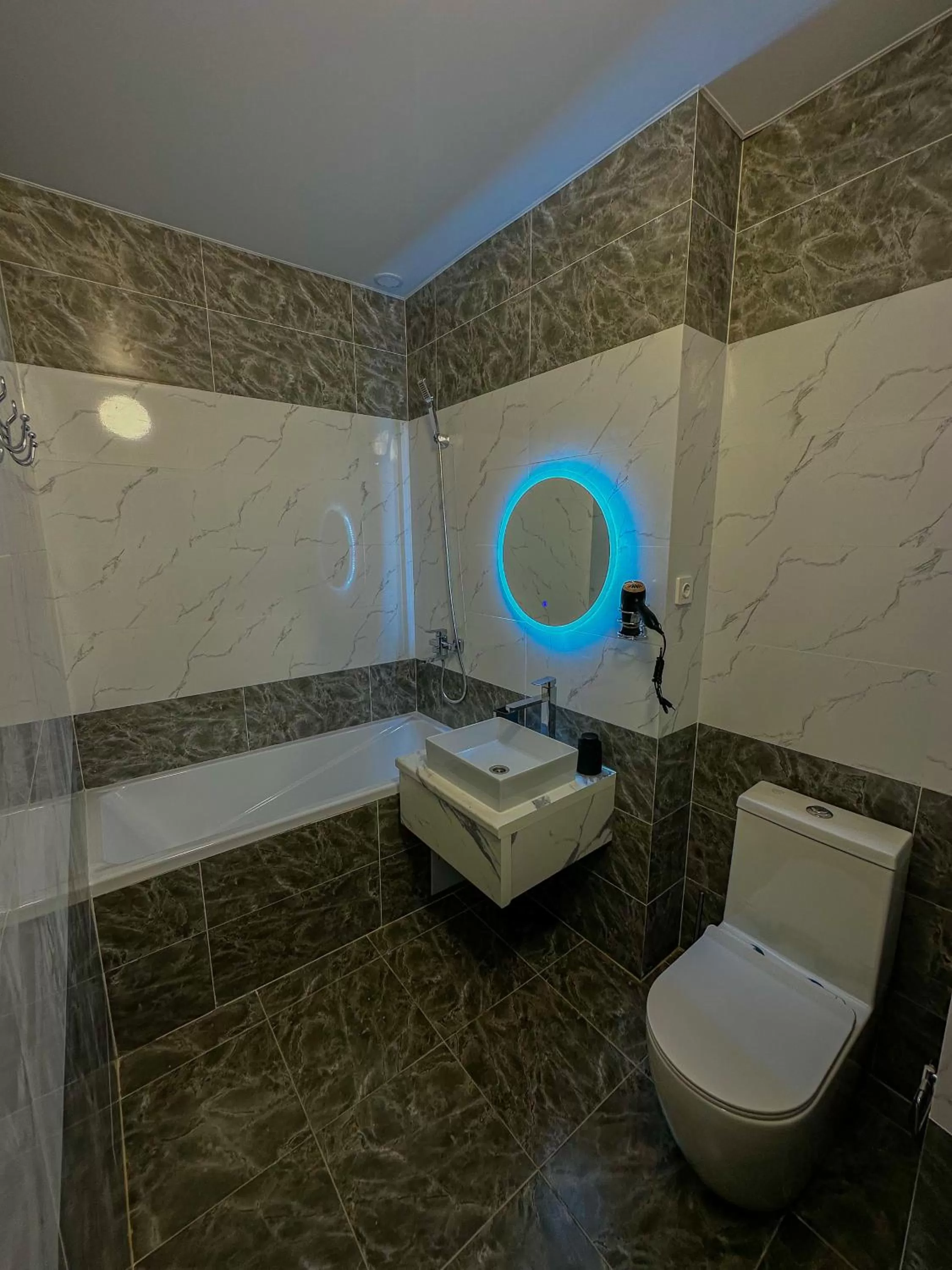 Bathroom in Astina Hotel