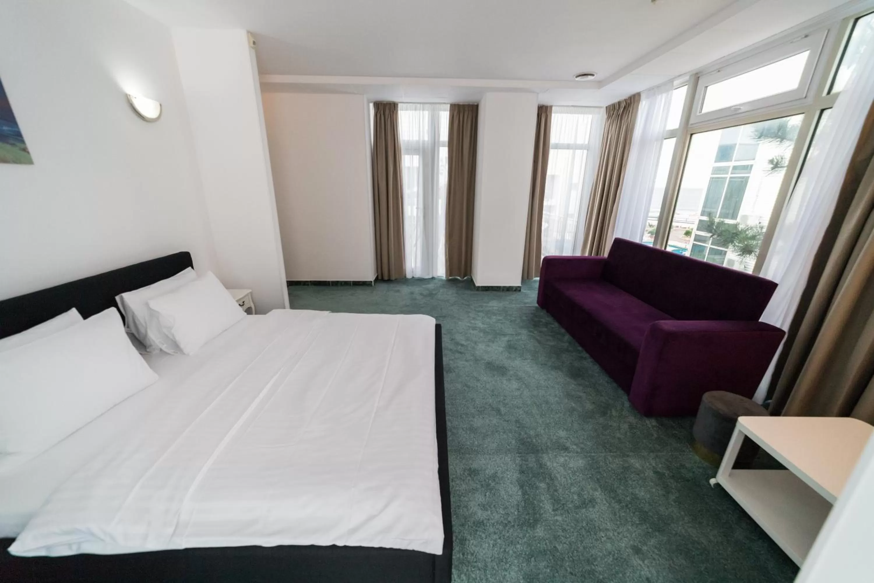 Bed in Avenue Palm Eforie - Avenue Hotels