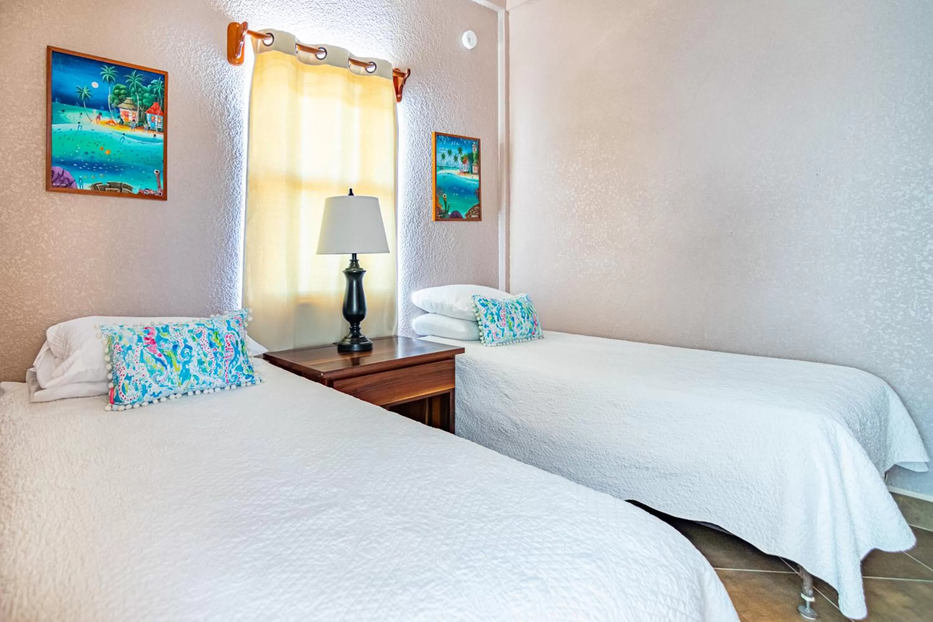 Bed in Lighthouse Beach Villas