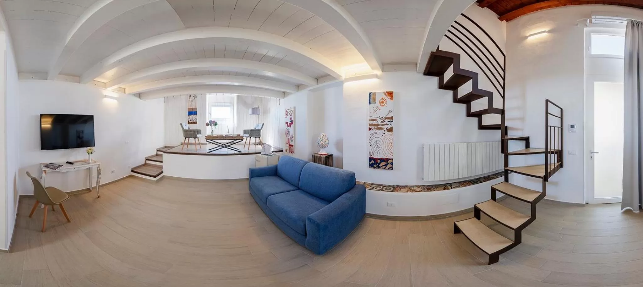 Bed in Le Maestranze Deluxe Rooms