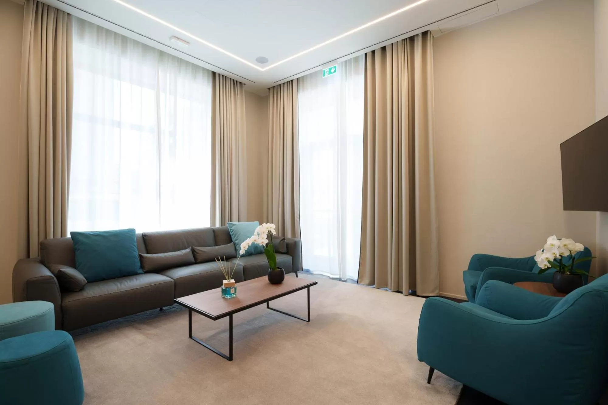 Communal lounge/ TV room in Vi Suites