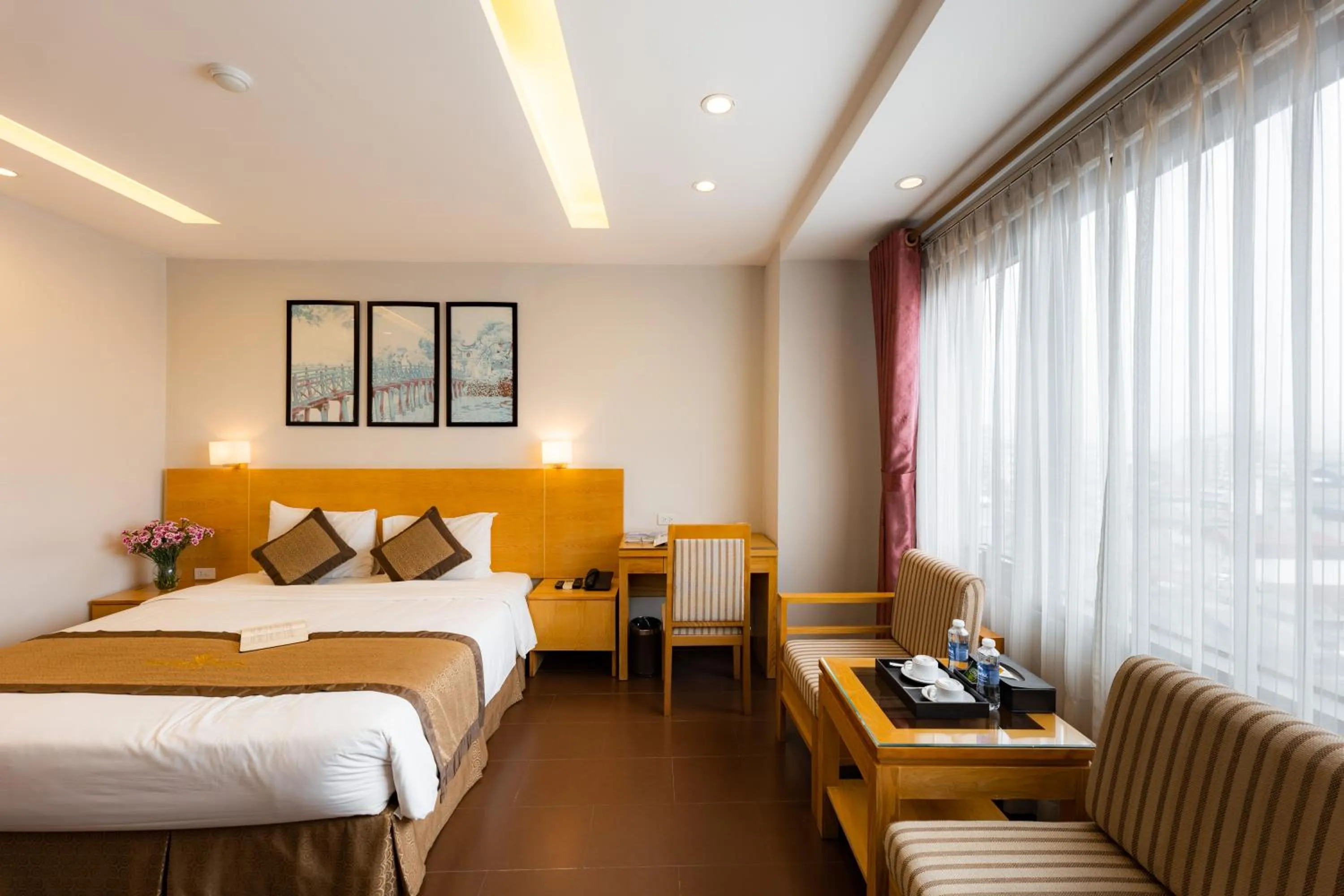 Bed in Riverside Hanoi Hotel