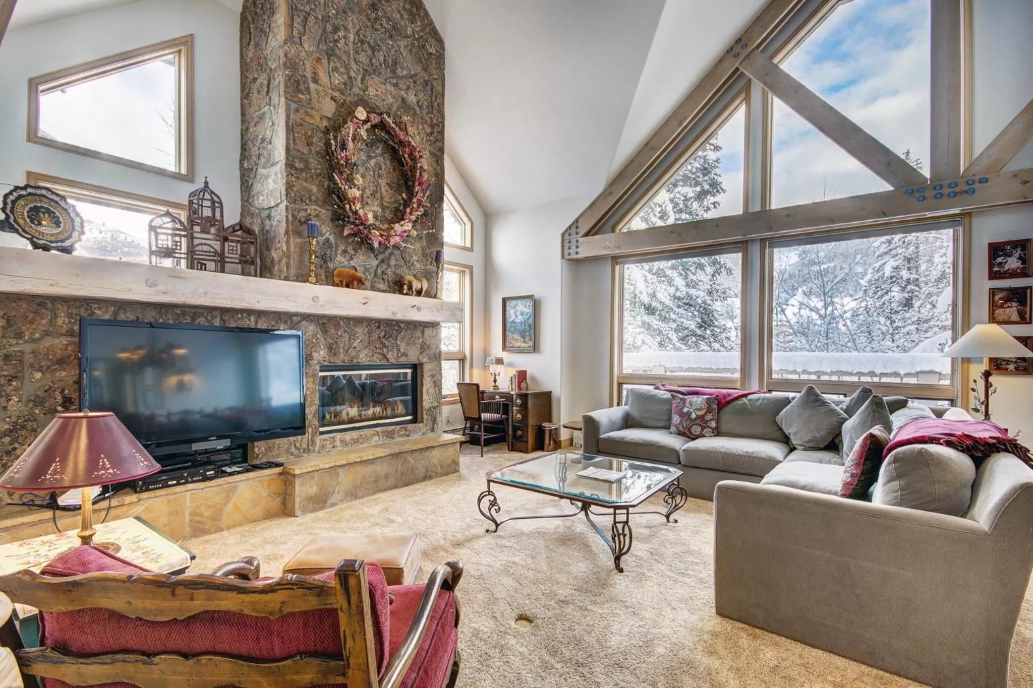 Living room in The Pines Lodge, a RockResort, by Vail Resorts