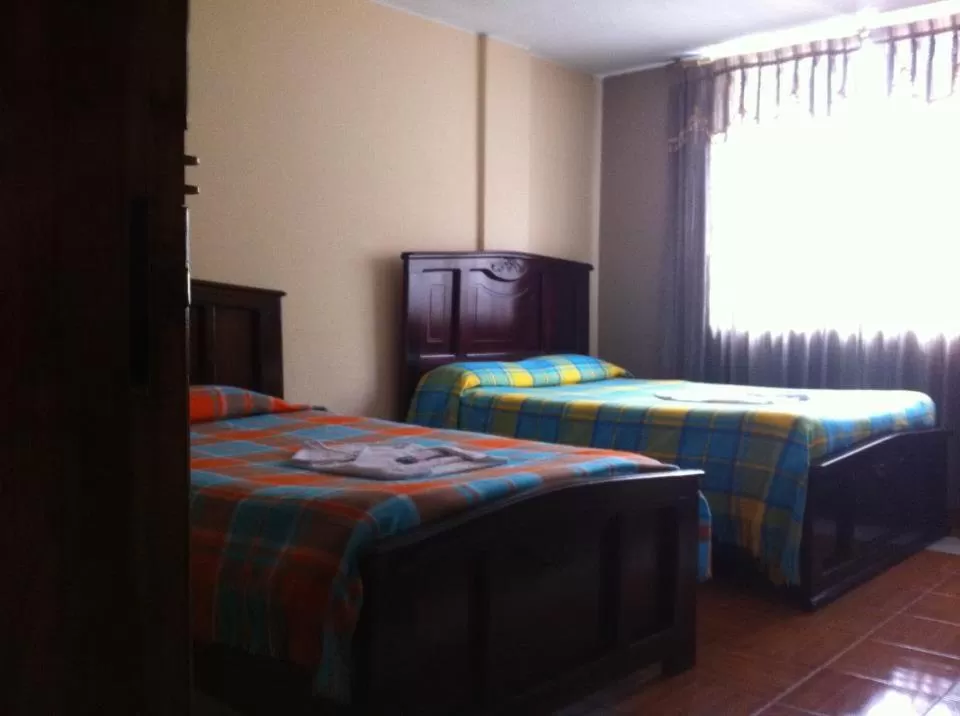 Bed in Hostal Jora Continental