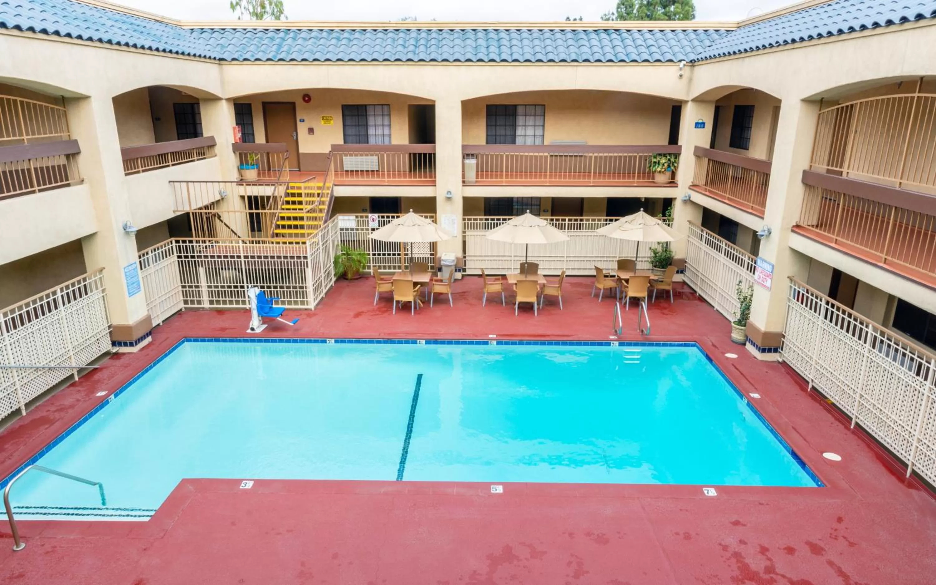 Swimming pool in Days Inn & Suites by Wyndham Artesia