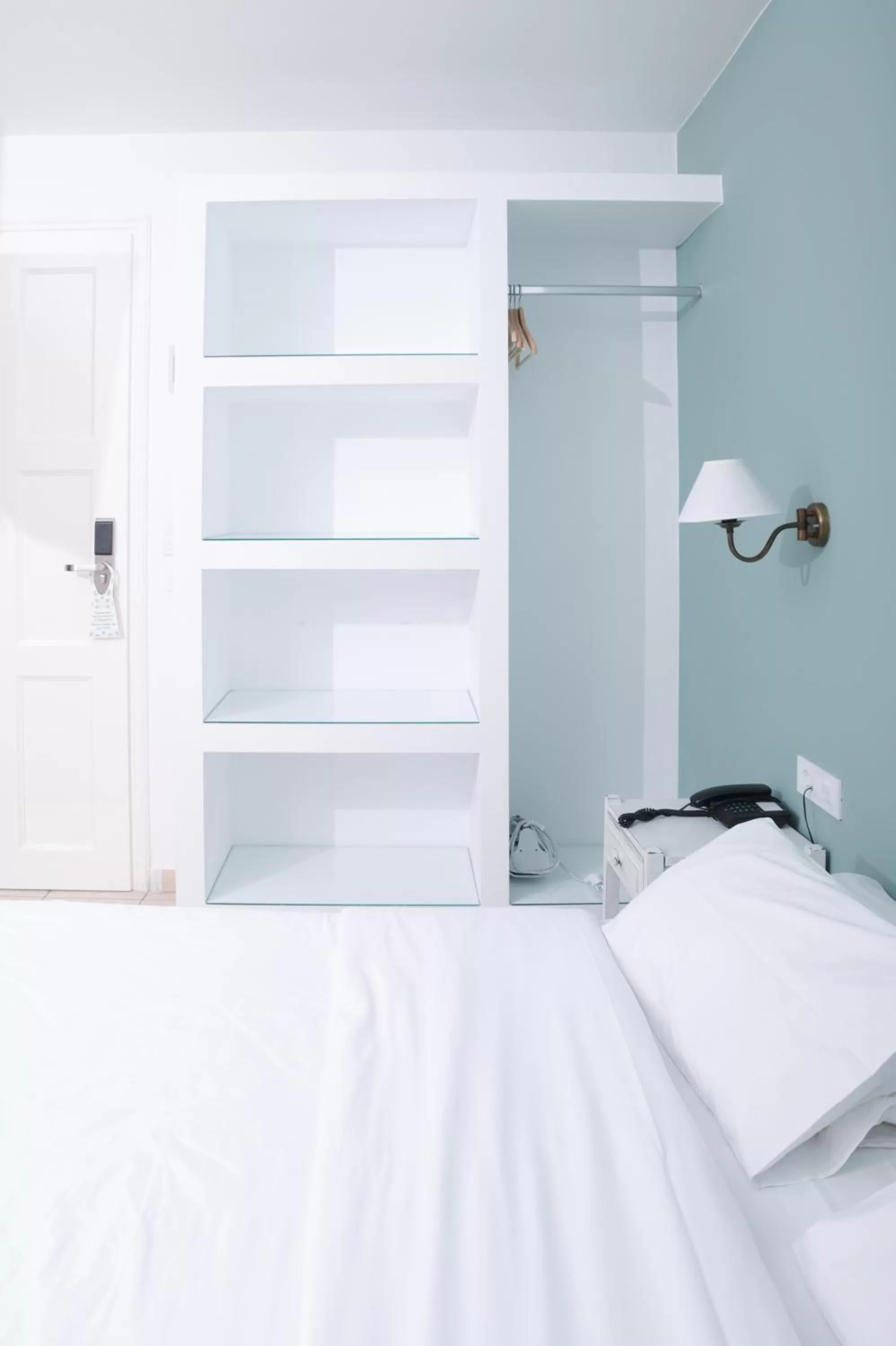 Bed in Ikaros Art Hotel