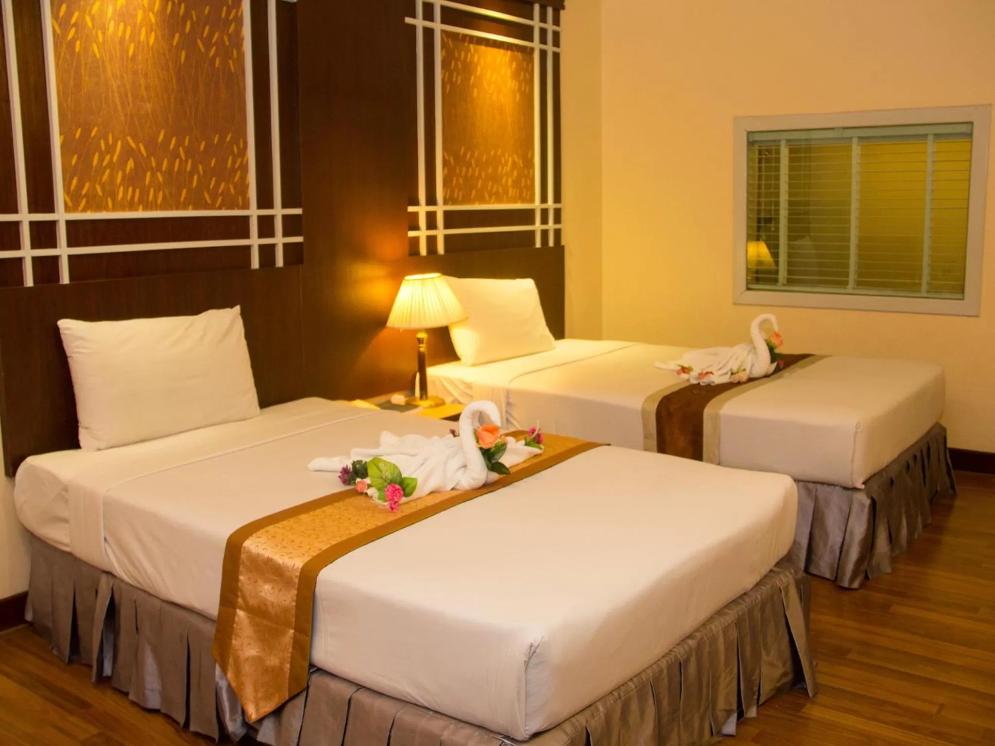 Bed in Friendlytel Hotel