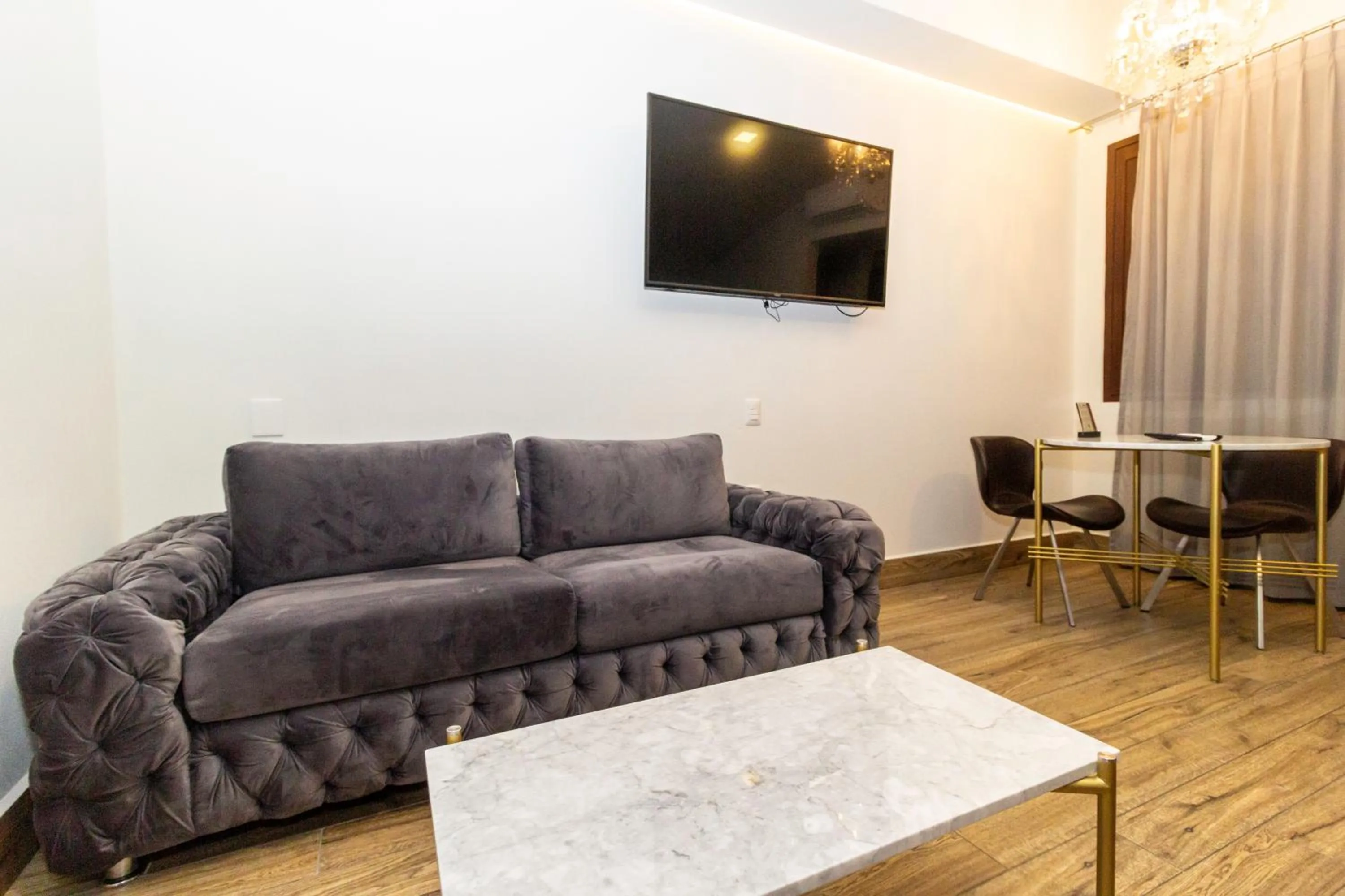 Living room in Hotel Boutique Naura Centro