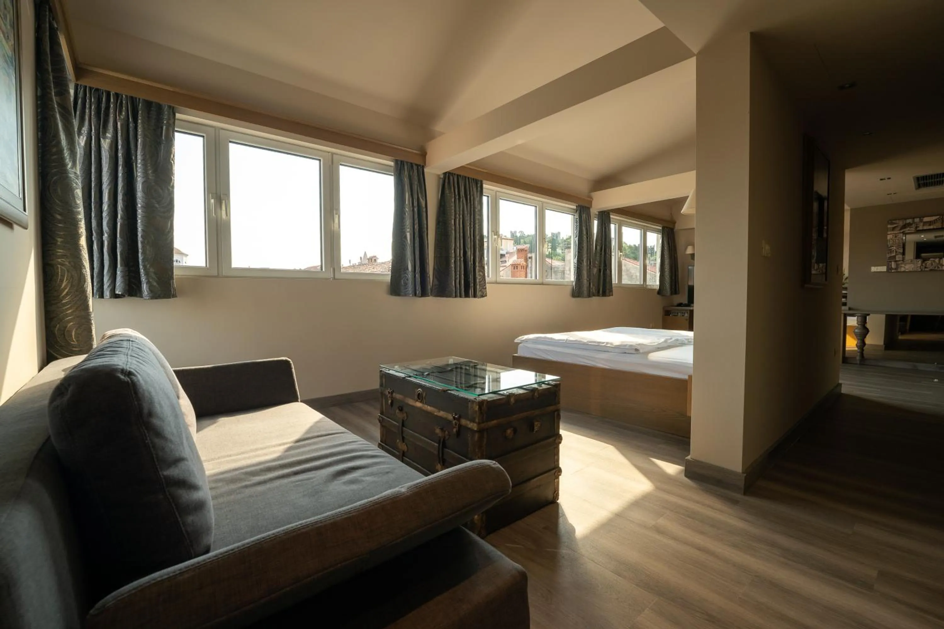 Seating area, Bed in Hotel Piran