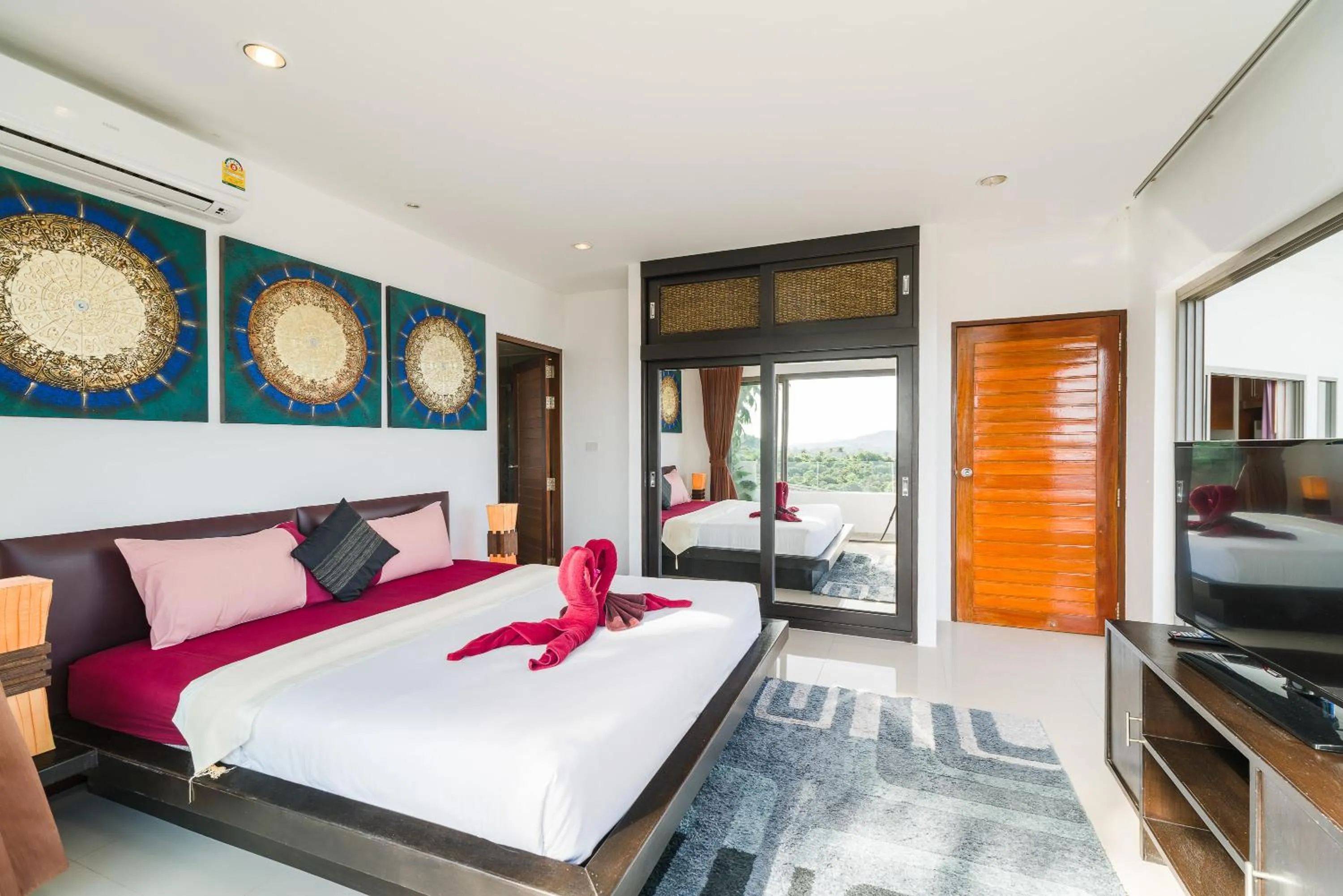 Bed in Tropical Sea View Residence