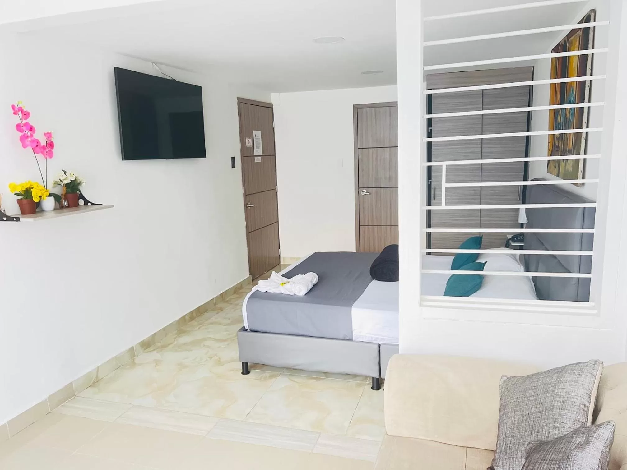 Photo of the whole room, TV/Entertainment Center in La Forêt de Café Hotel