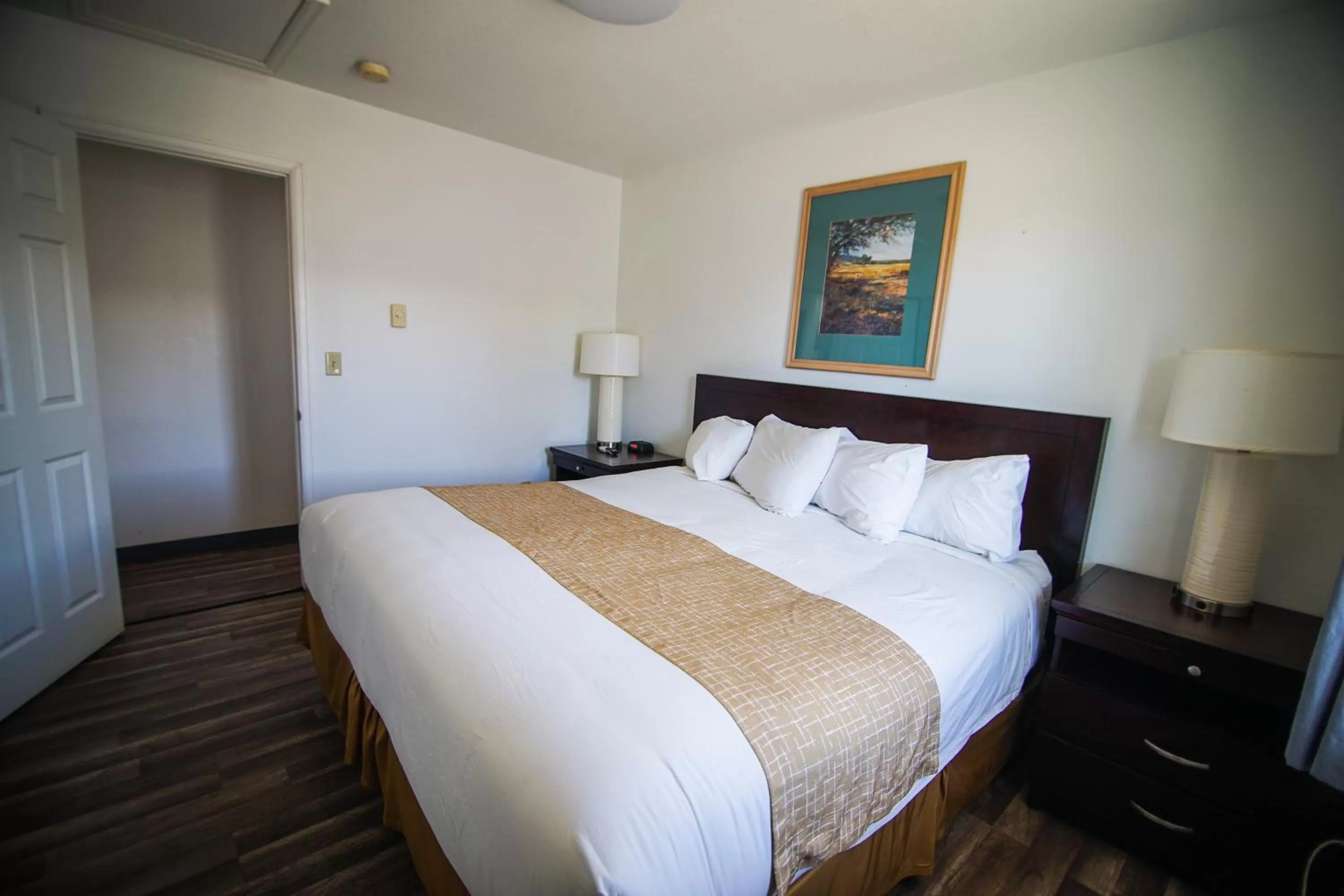 Bedroom, Bed in Travelodge by Wyndham Colorado Springs Airport - Peterson SFB