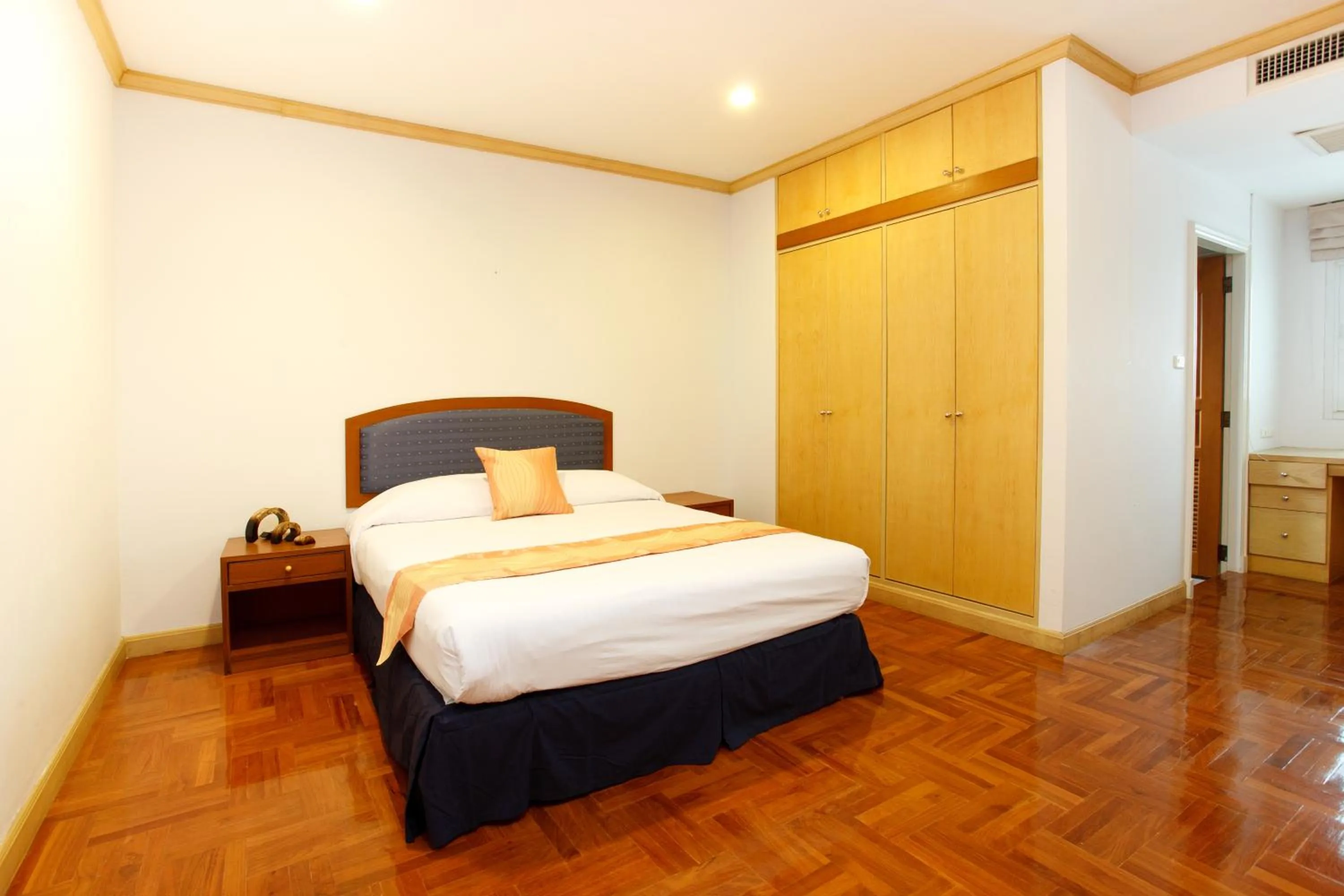 Bed in Chaidee Mansion