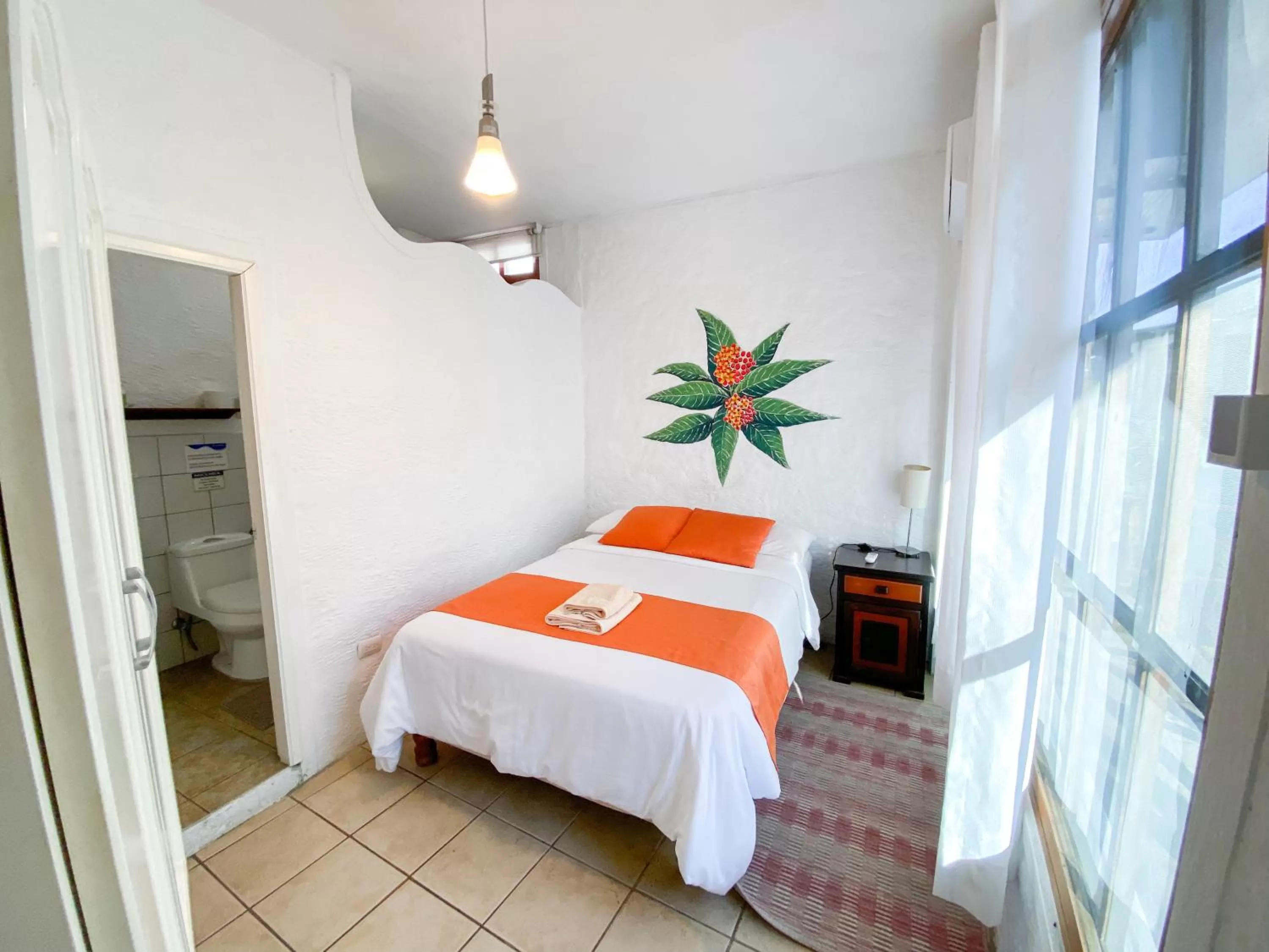 Bed in Hotel Miconia