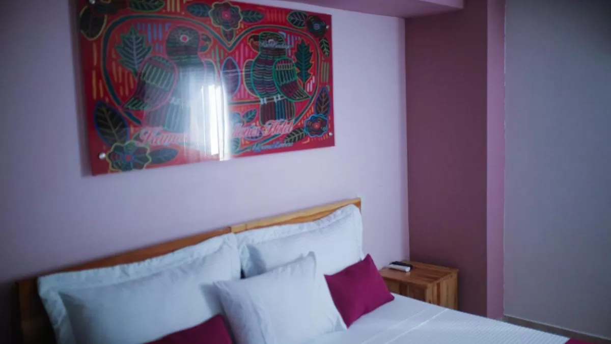 Bed in Kamaleb Farallones Hotel