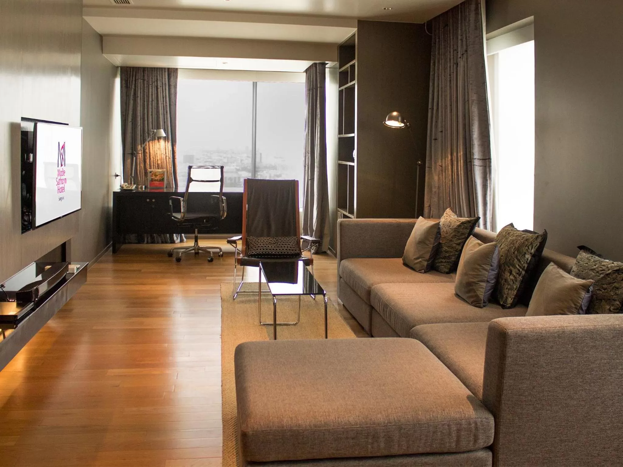 Living room in Mode Sathorn Hotel - SHA Extra Plus