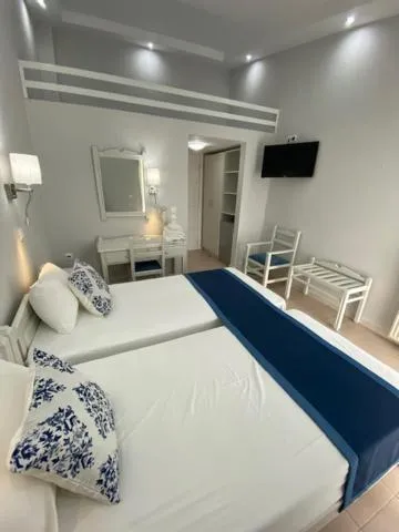 Bed in Ifestos Hotel