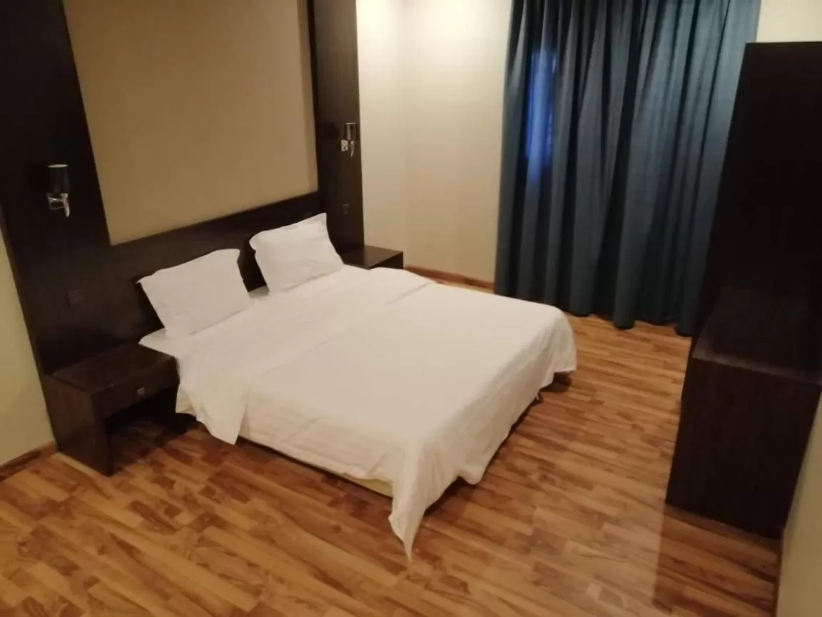 Bed in Drr Ramah Hotel Apartments 10