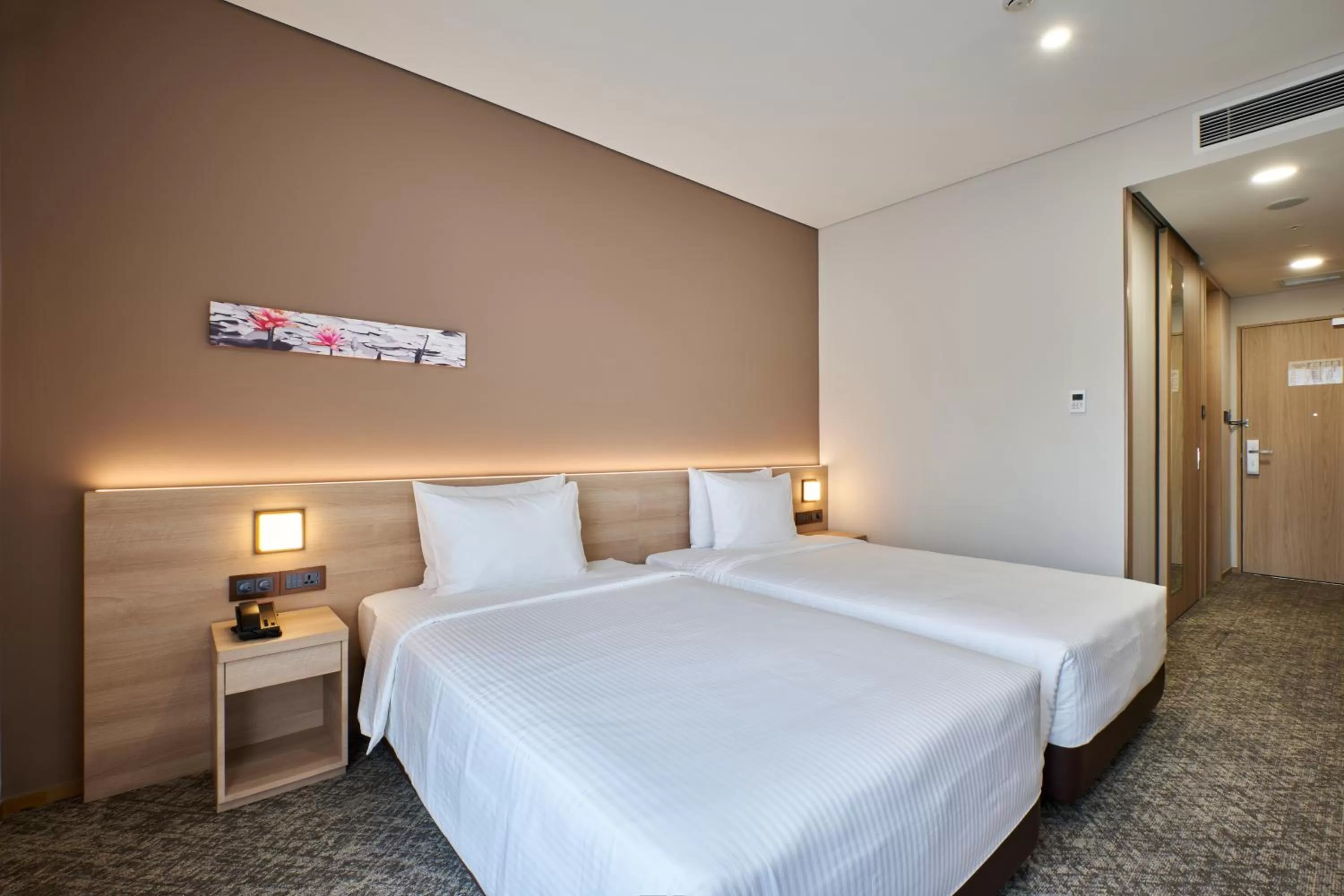Photo of the whole room, Bed in Sotetsu Grand Fresa Saigon