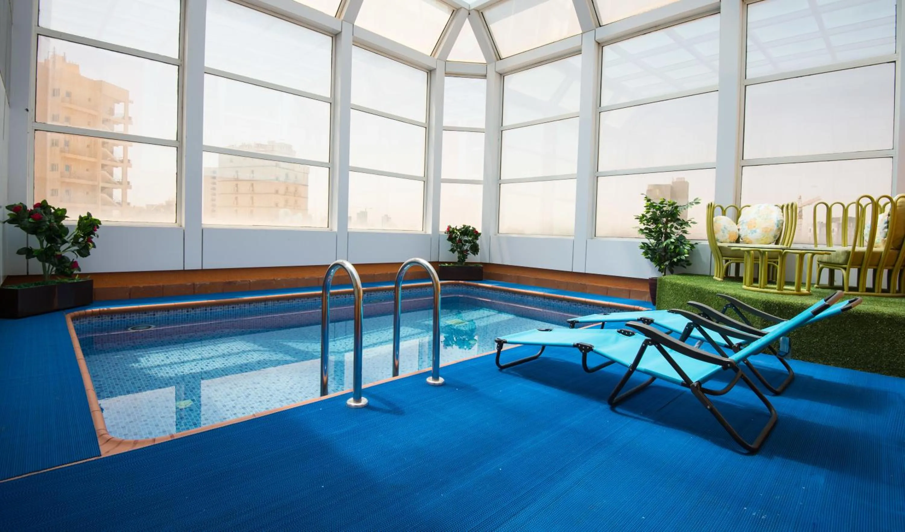 Swimming pool in Bravo Royal Hotel Suites