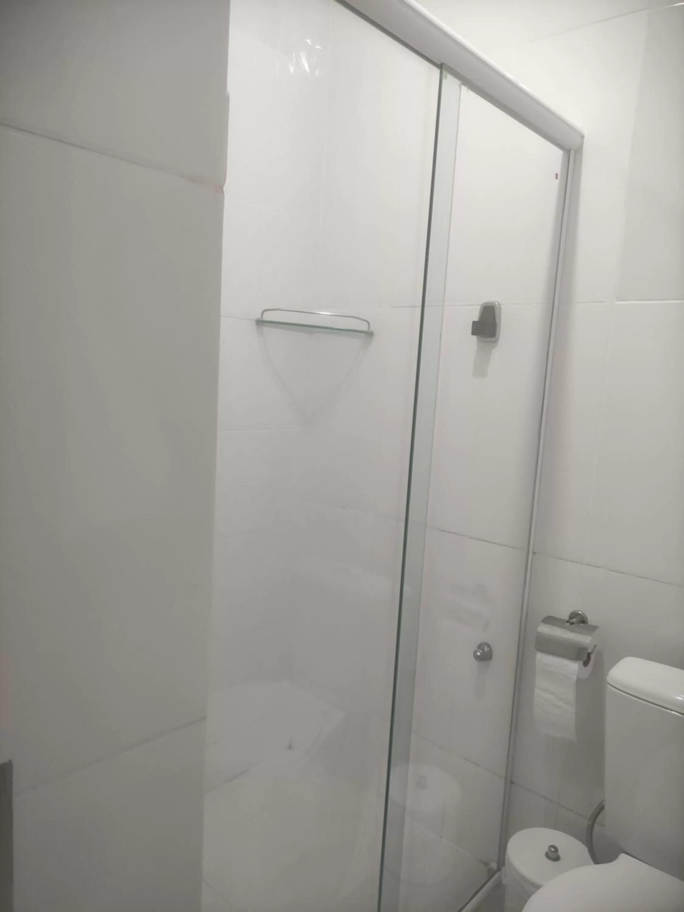 Bathroom in Pousada da Gi Suítes e Turismo