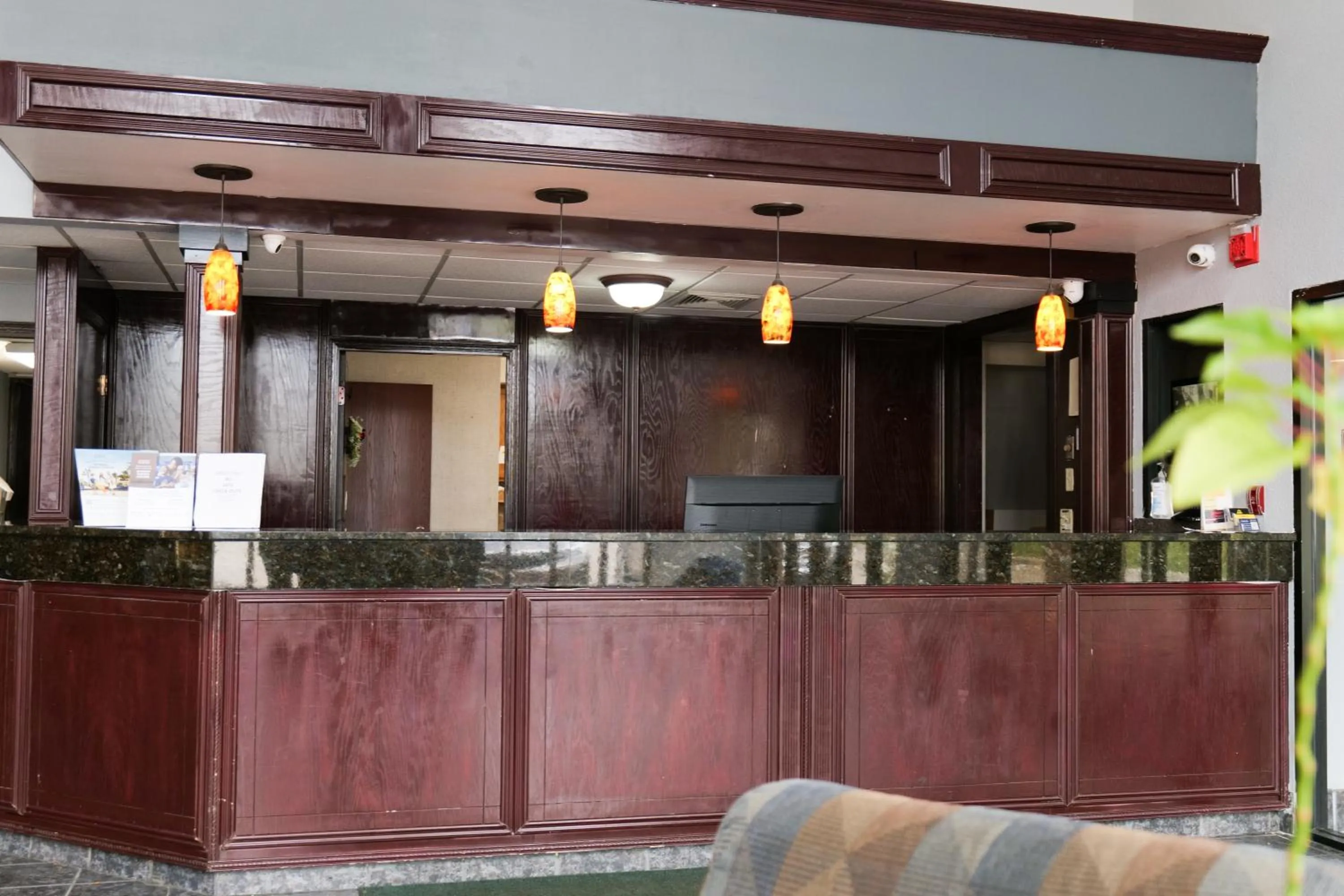 Lobby or reception in Baymont by Wyndham Flint Airport North